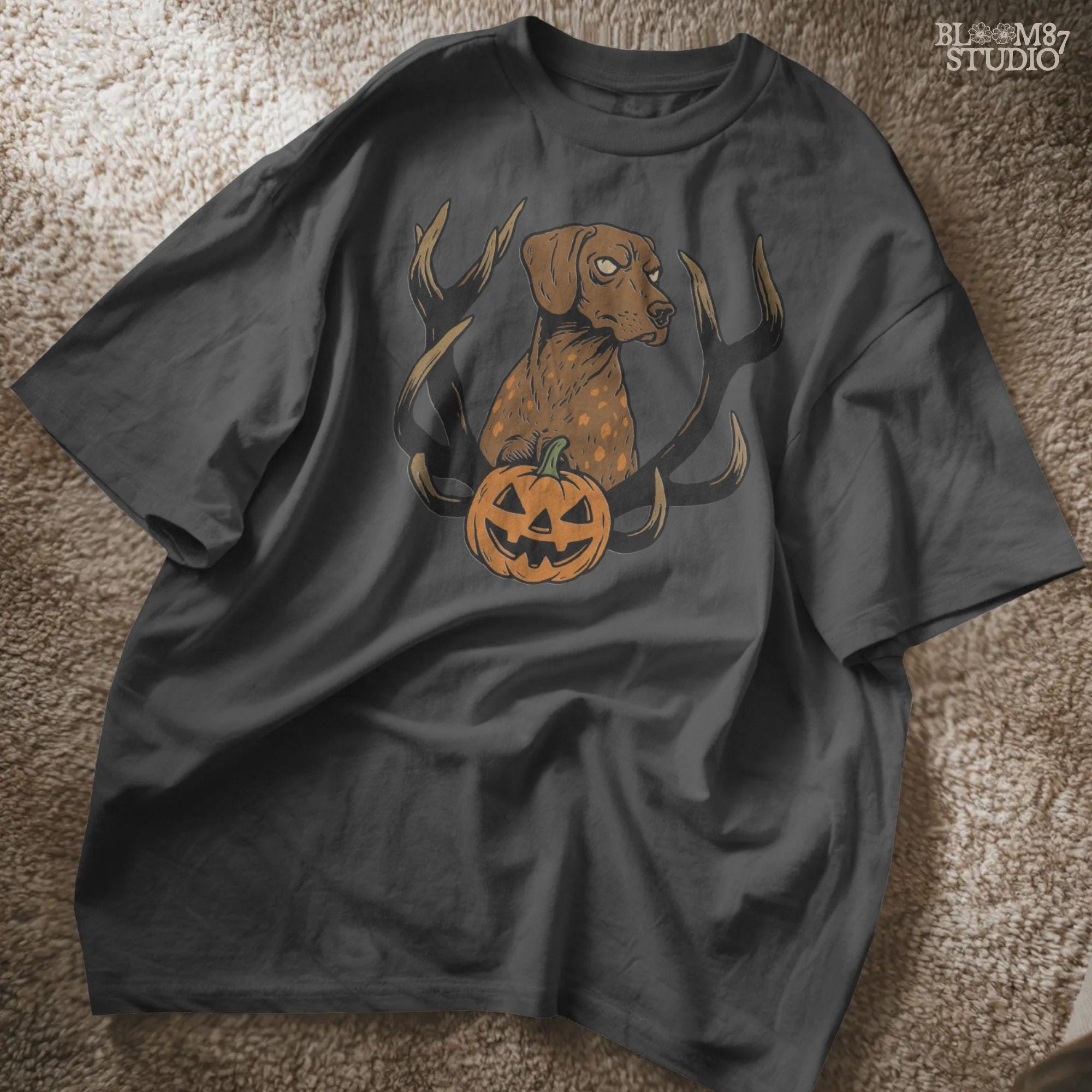 Solid version: Halloween dog PNG with antlers and pumpkin, spooky hunting dog digital download.

Distressed version: Vintage Halloween dog PNG with antlers and jack-o’-lantern, rustic hunting sublimation design.