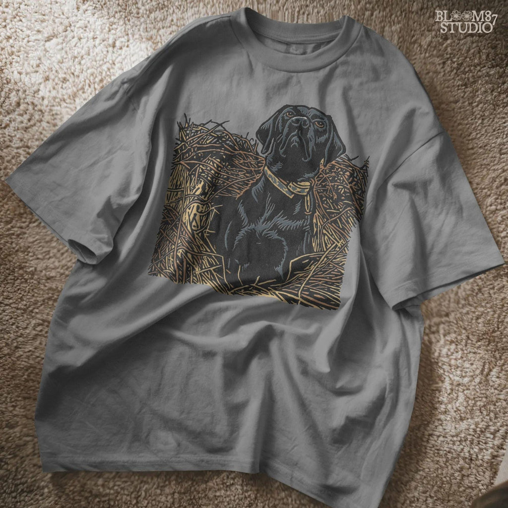 Illustration of a black Labrador retriever hunting dog sitting in tall grass, duck hunting sublimation PNG design.
