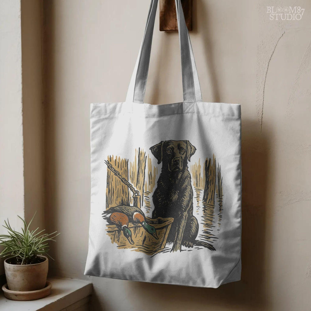 Illustration of a black Labrador retriever hunting dog in a marsh with mallard ducks in a wooden basket, sublimation PNG design.
