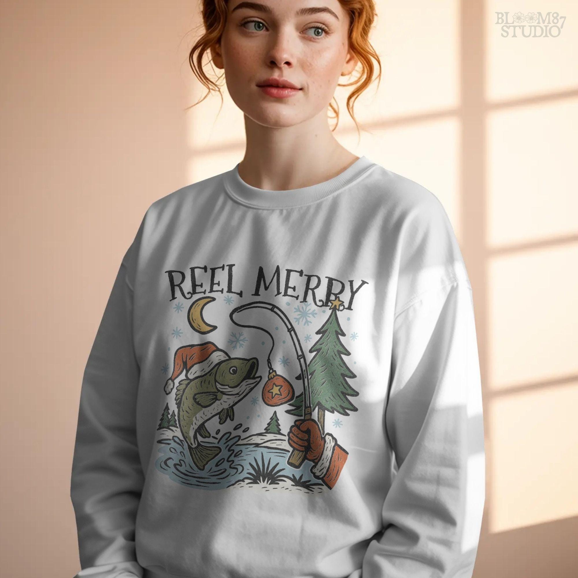 Solid: “Christmas fishing PNG with bass wearing Santa hat jumping near holiday tree, Reel Merry text design for shirts”

Distressed: “Vintage distressed Christmas fishing PNG with bass, Santa hat, holiday tree and Reel Merry festive design”