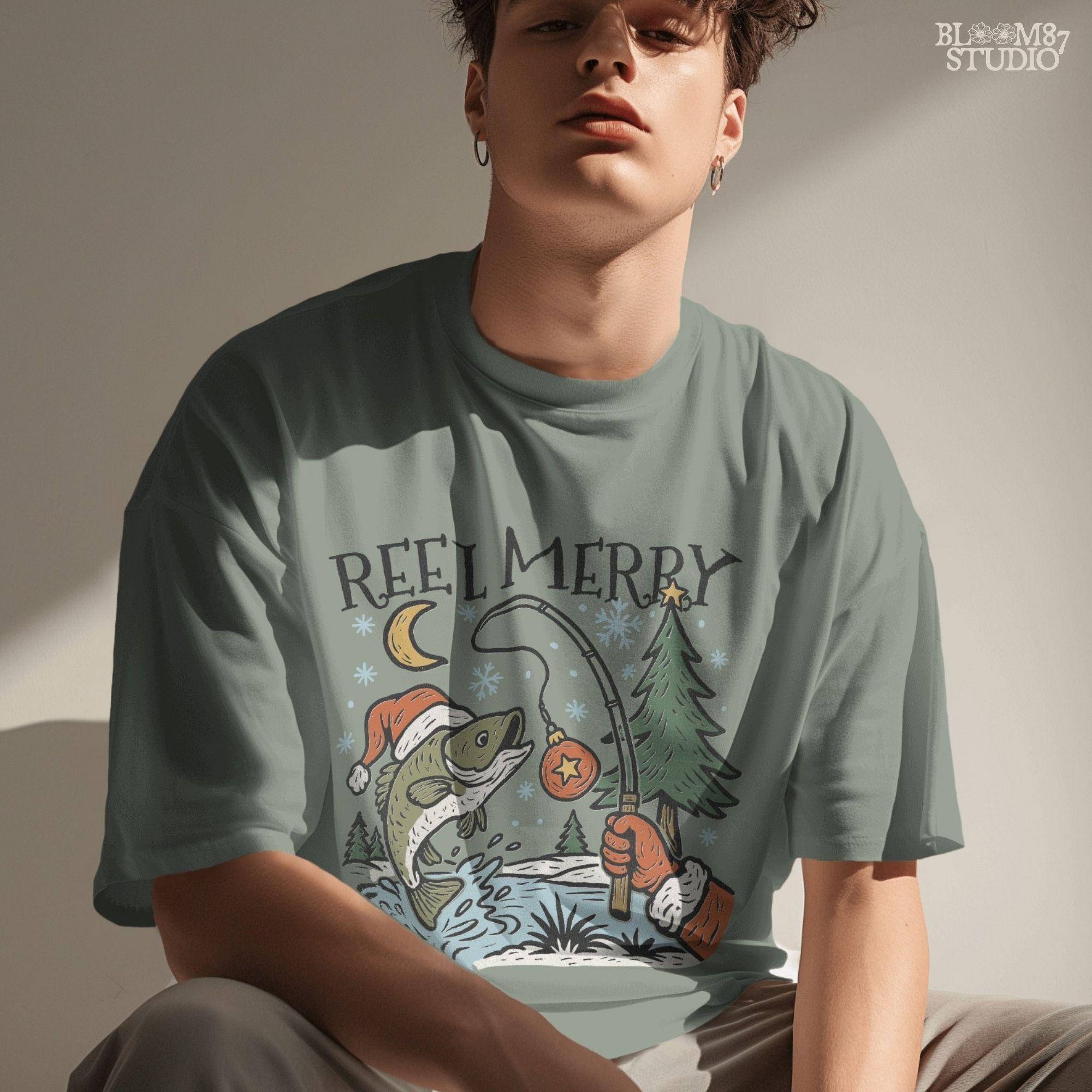 Solid: “Christmas fishing PNG with bass wearing Santa hat jumping near holiday tree, Reel Merry text design for shirts”

Distressed: “Vintage distressed Christmas fishing PNG with bass, Santa hat, holiday tree and Reel Merry festive design”