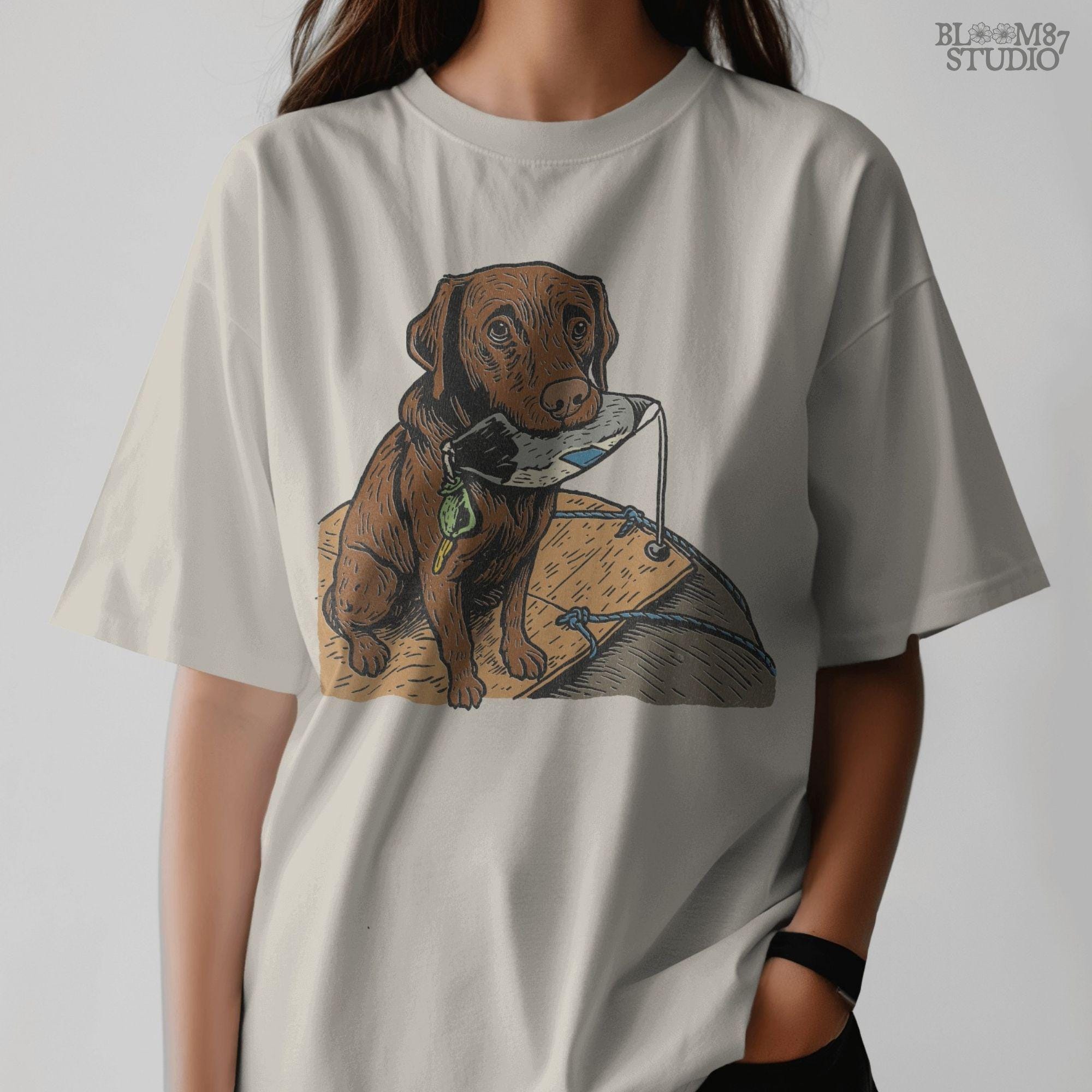 Illustration of a chocolate Labrador retriever holding a duck decoy on a wooden dock, rustic hunting dog PNG for sublimation crafts.