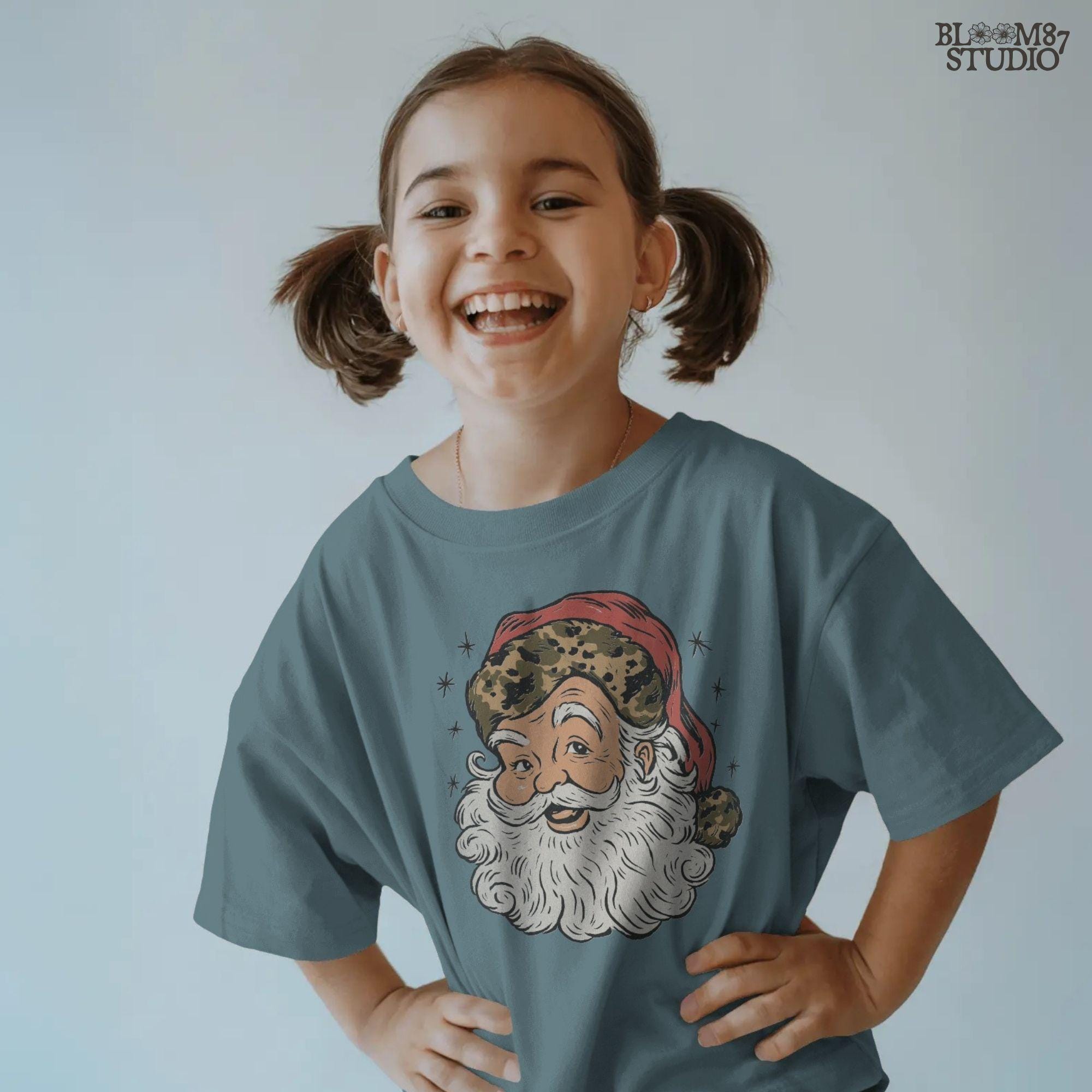 Solid Version: "Vintage Santa Claus face with white beard and red hat trimmed in leopard print fur, retro Christmas PNG design for sublimation projects"
Distressed Version: "Distressed retro-style PNG of Santa Claus with leopard print hat, rustic vintage sublimation design for holiday shirts, mugs, and crafts"