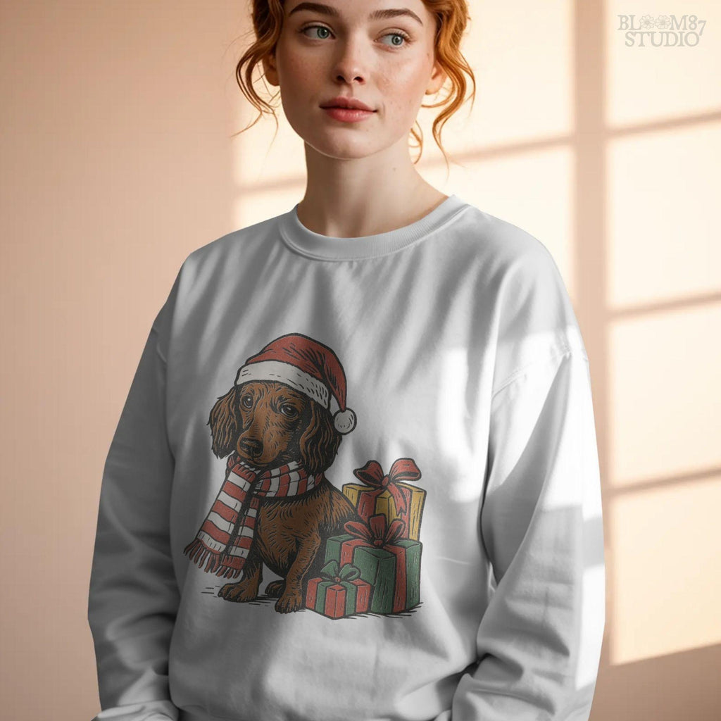 Holiday dachshund illustration wearing Santa hat and scarf with Christmas presents, designed for sublimation projects, t-shirt graphics, and holiday mugs.