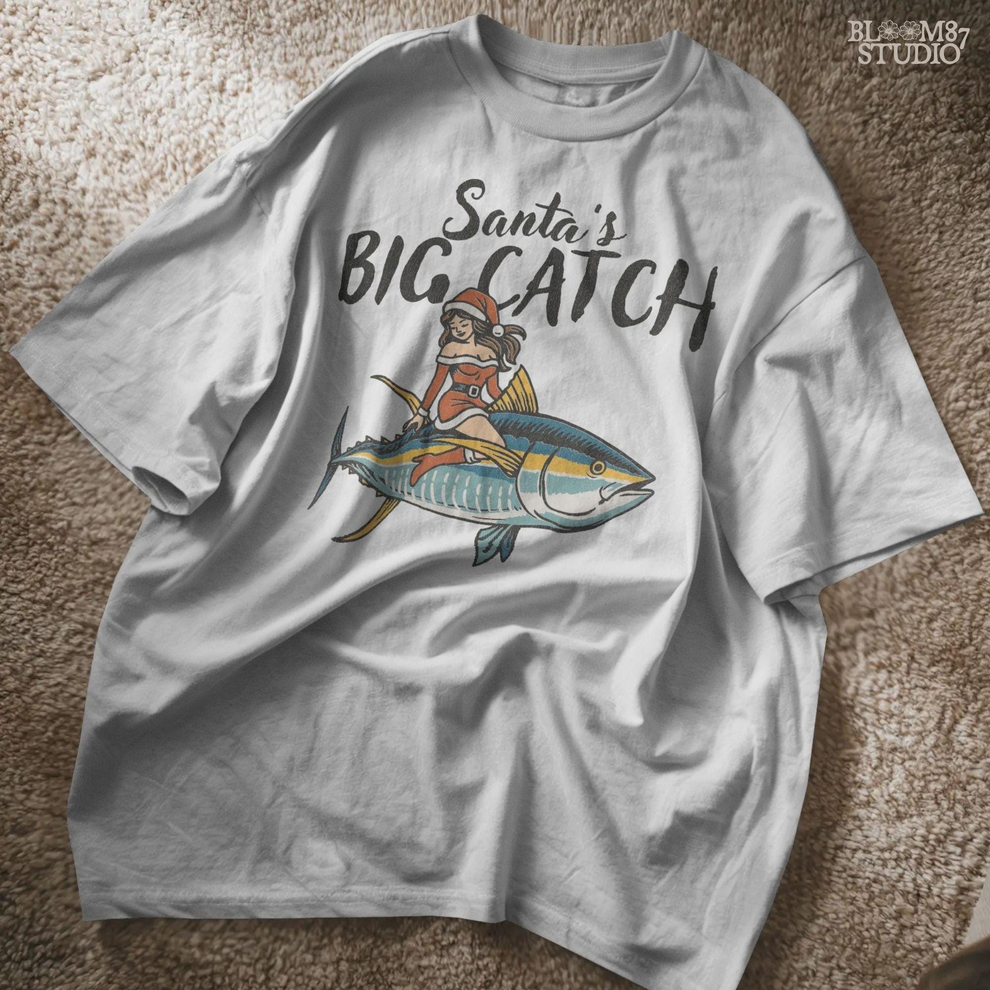 Funny Christmas fishing design with Santa girl riding a tuna. Santa’s Big Catch PNG file is perfect for fisherman holiday shirts, sweatshirts, mugs, and ornaments. Great sublimation artwork for anglers and coastal Christmas decor. High-resolution transparent PNG ensures professional-quality prints and versatile use for crafting, apparel, and gift projects.