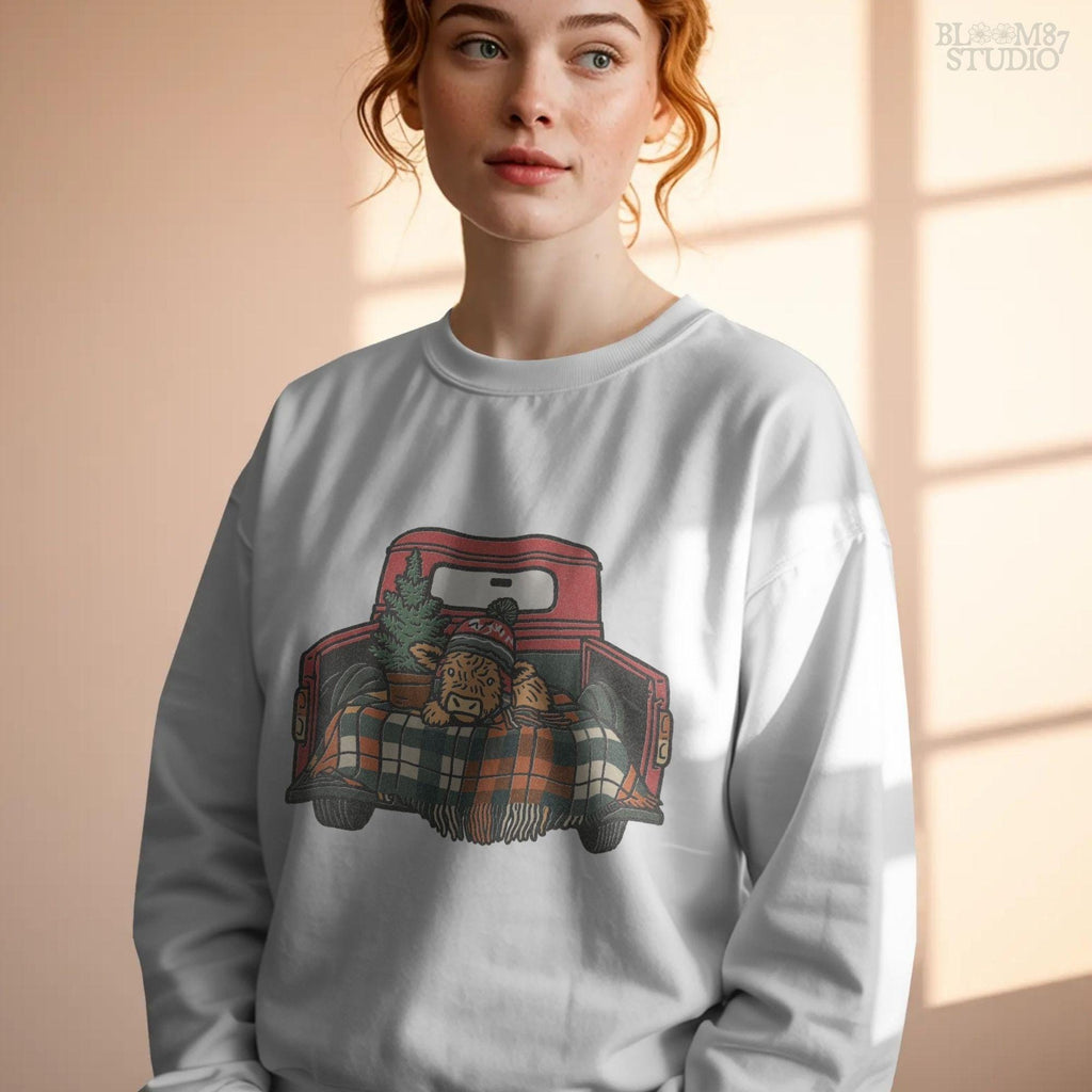 Farmhouse Christmas sublimation PNG with Highland cow resting in red truck bed. Cow wears festive hat, cozy plaid blanket and sits with small tree. Perfect design for rustic Christmas shirts, mugs, tumblers, and holiday decor. Transparent PNG ideal for crafts and gifts.
