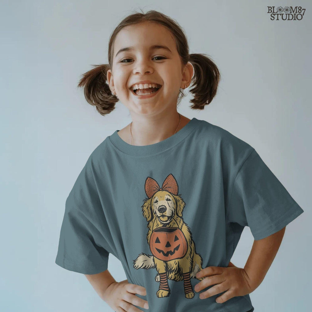 Solid version: "Golden retriever holding pumpkin basket, Halloween sublimation PNG design with bow and striped socks, solid style"

Distressed version: "Golden retriever Halloween dog with pumpkin basket, sublimation PNG design, vintage distressed version"