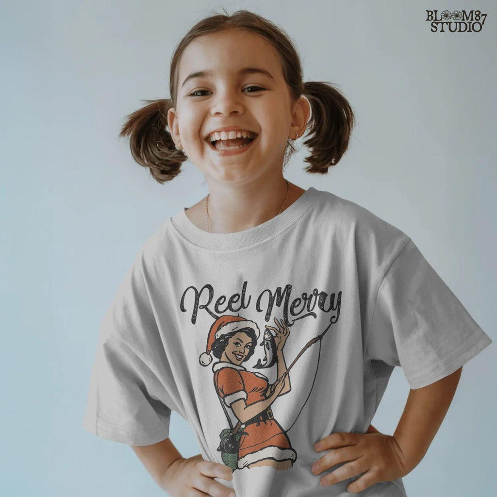 High-resolution PNG with a woman dressed as Santa holding a fishing rod and fish, perfect for Xmas shirt printing.