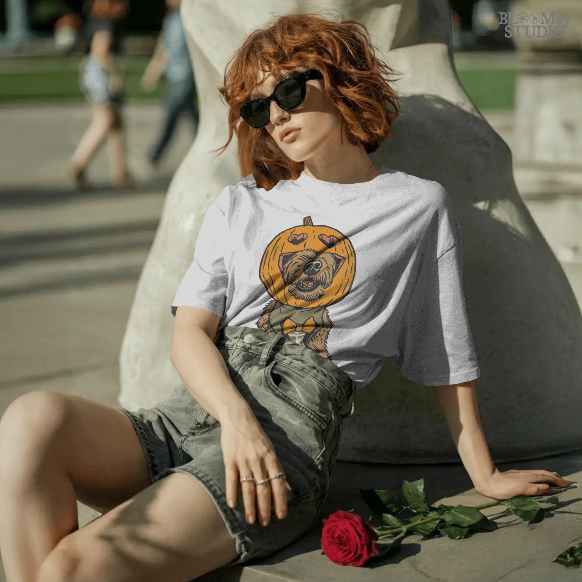 Solid version: "Dog with pumpkin jack o lantern head wearing bow tie, Halloween sublimation PNG, solid version"

Distressed version: "Halloween dog with pumpkin head costume and bow tie, sublimation PNG design, vintage distressed style"