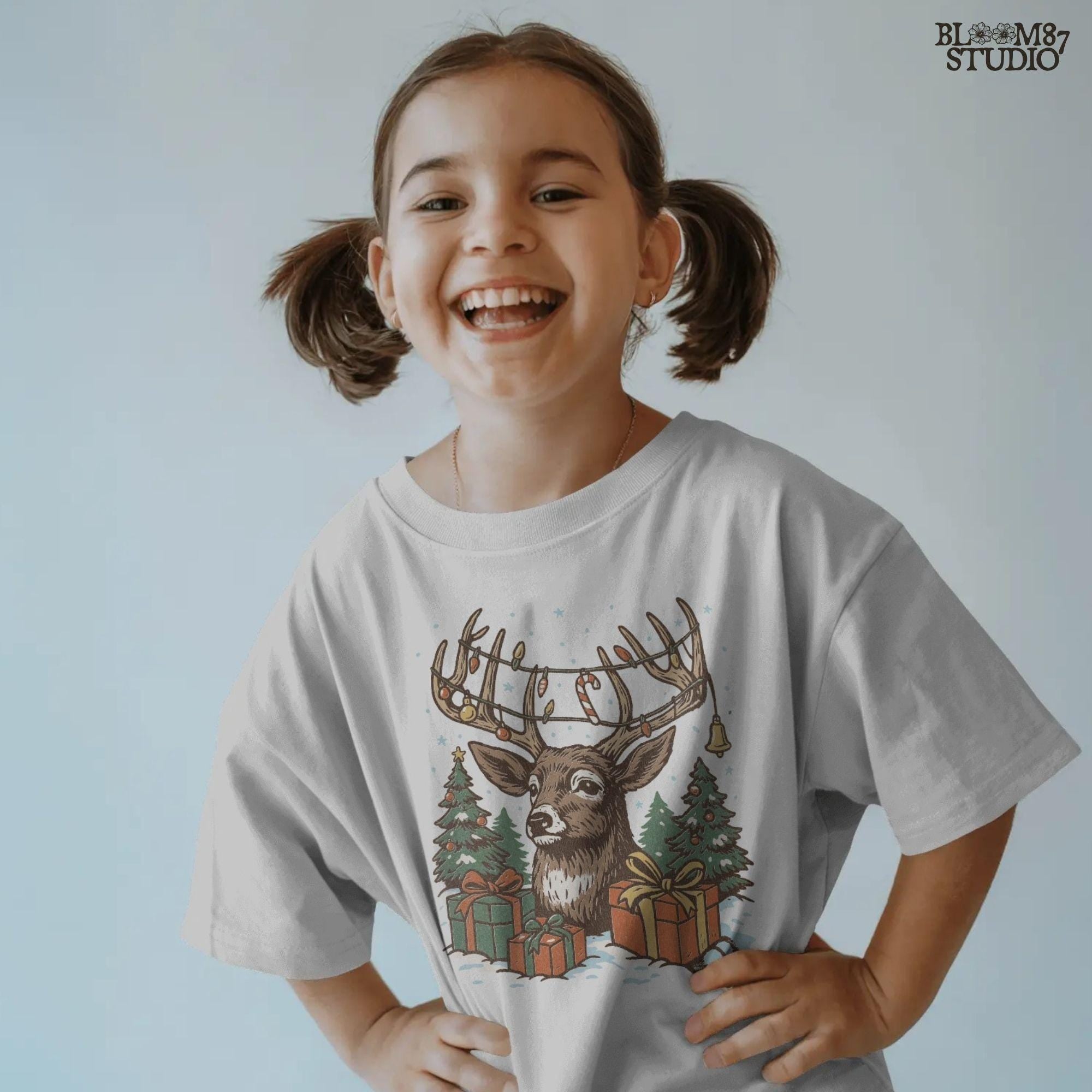 Festive rustic reindeer sublimation, Christmas antlers decorated with lights and ornaments, with gift boxes and Christmas trees. PNG design for t-shirts, mugs, holiday ornaments, farmhouse signs, and seasonal DIY crafting.