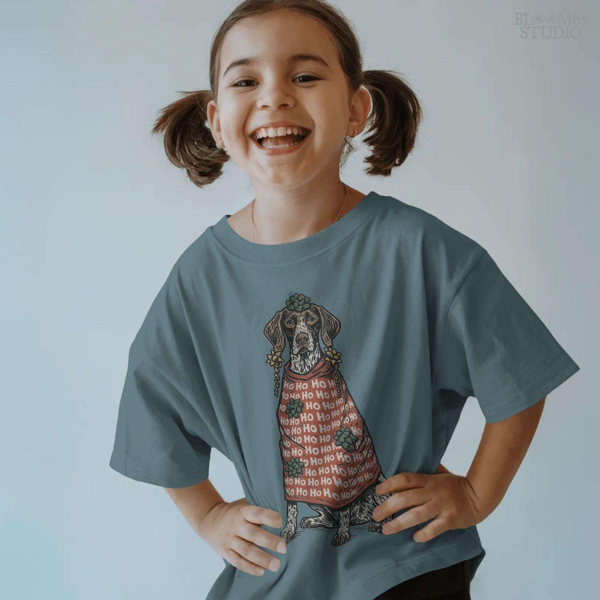 Solid version: "Christmas German Shorthaired Pointer sublimation PNG dog in red Ho Ho Ho sweater with gift bows holiday clipart solid style"

Distressed version: "German Shorthaired Pointer sublimation PNG dog wrapped like gift in Ho Ho Ho sweater with bows rustic holiday clipart distressed style"