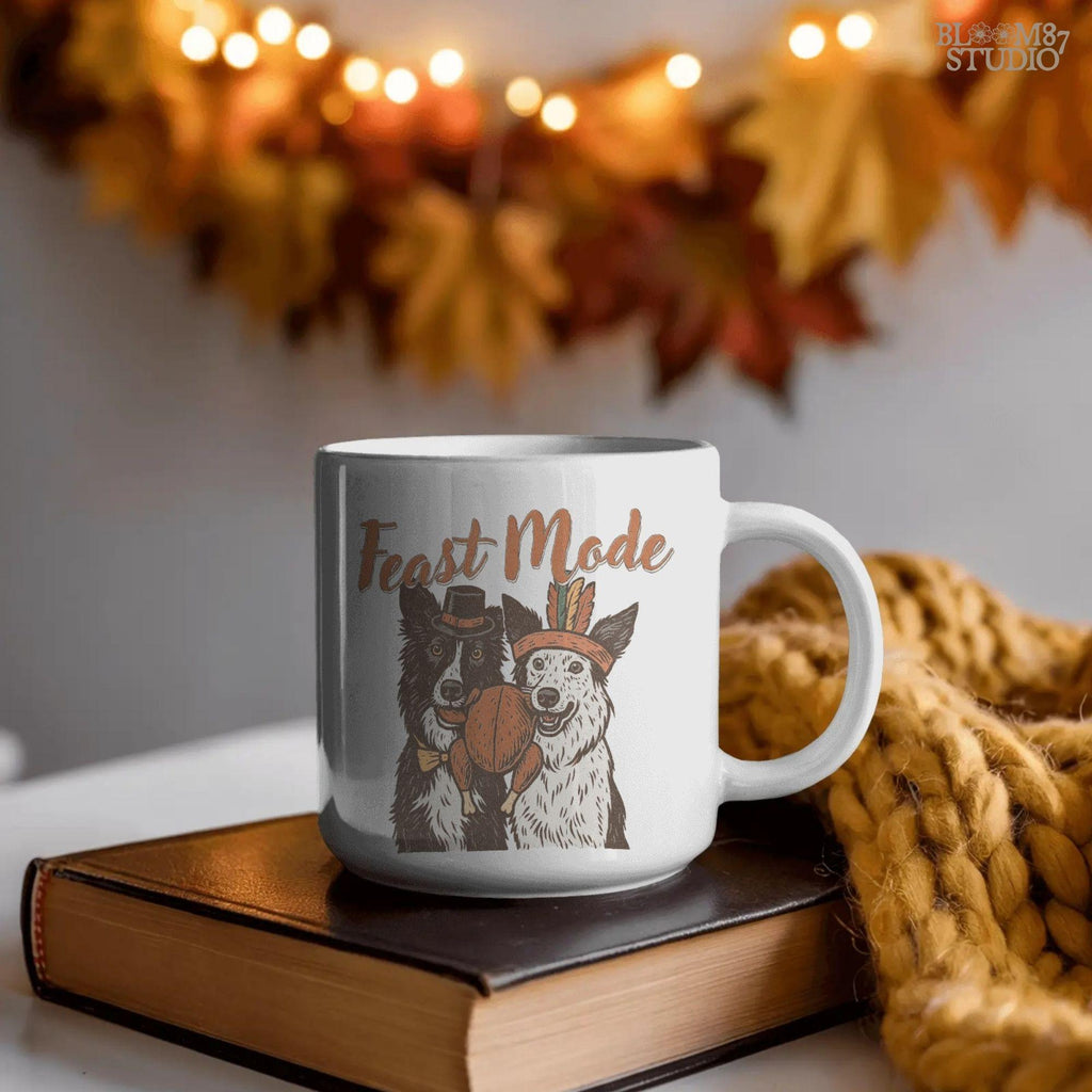 Comical Thanksgiving dog PNG design featuring border collies and Feast Mode lettering. Great for pet lover gifts, turkey day shirts, rustic farmhouse prints, and sublimation on mugs.