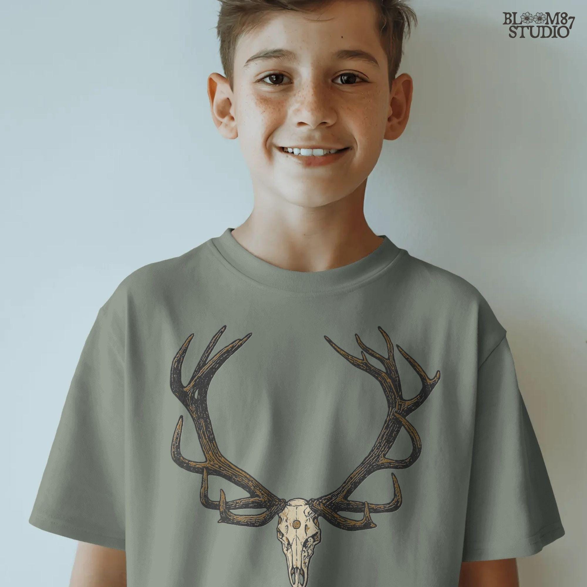 Solid version: "Deer skull sublimation PNG with large antlers rustic hunting lodge wall art solid design"

Distressed version: "Distressed deer skull sublimation PNG with antlers rustic western hunting clipart vintage style"