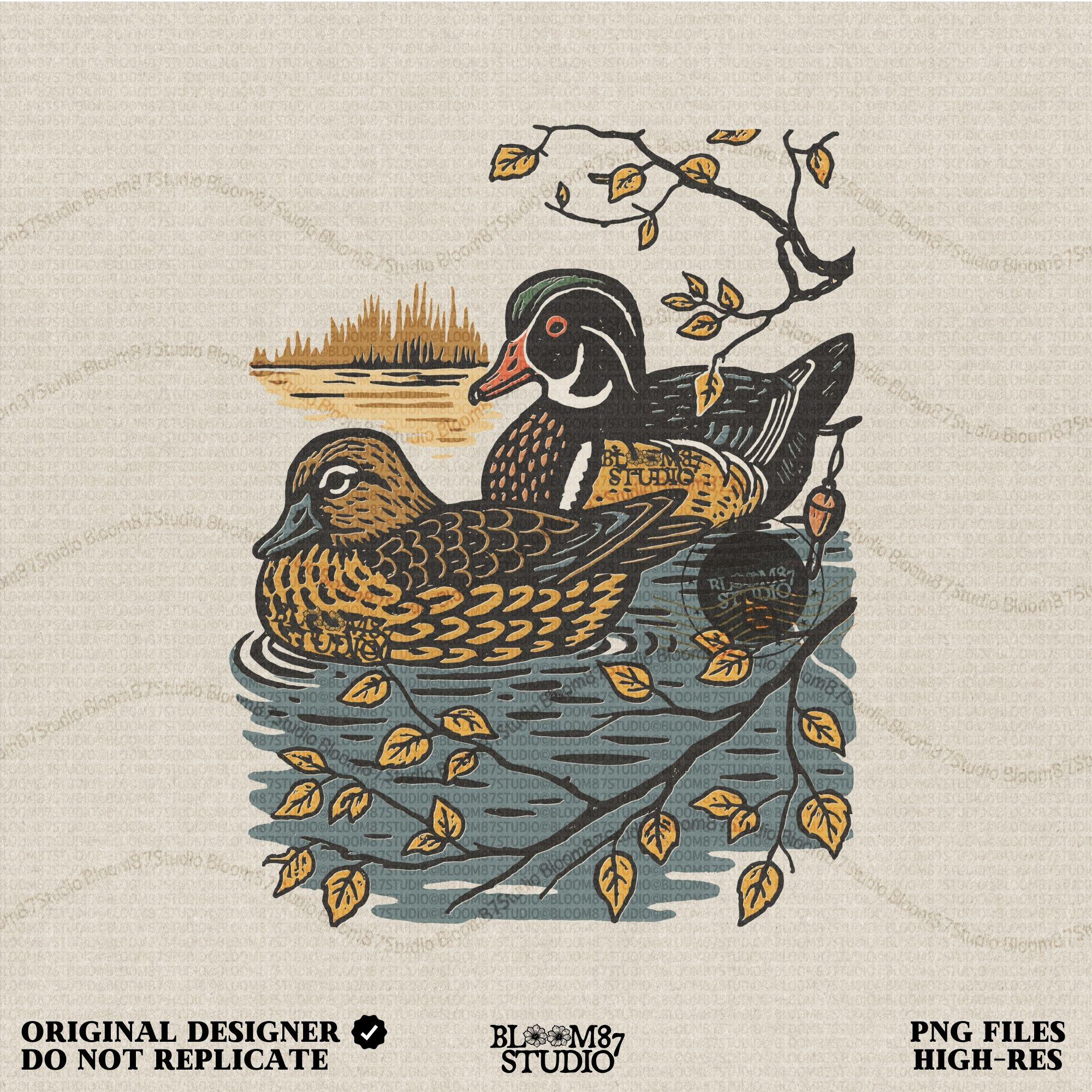 Vintage illustration of a wood duck couple floating on a pond, surrounded by fall leaves and branches, ideal for rustic nature sublimation.

Distressed Version:
Distressed wood duck pair in a peaceful pond setting with autumn leaves, perfect for farmhouse wildlife crafts and romantic outdoor art.