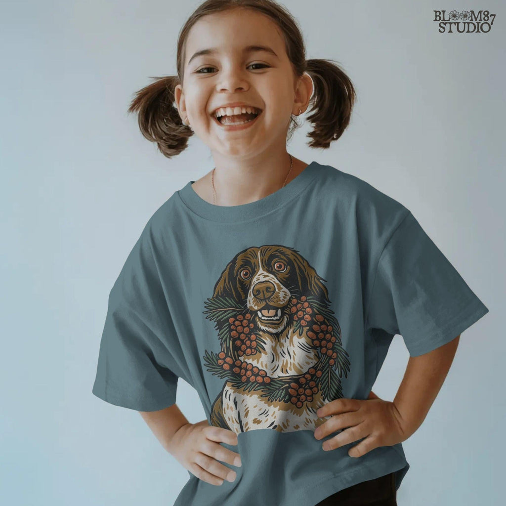 Solid Version:
Vintage illustration of a brown and white dog holding a berry and pine wreath, sublimation PNG for rustic Christmas crafts and holiday decor.

Distressed Version:
Distressed festive dog with berry wreath artwork, rustic sublimation PNG perfect for farmhouse Christmas shirts, mugs, and seasonal gifts.