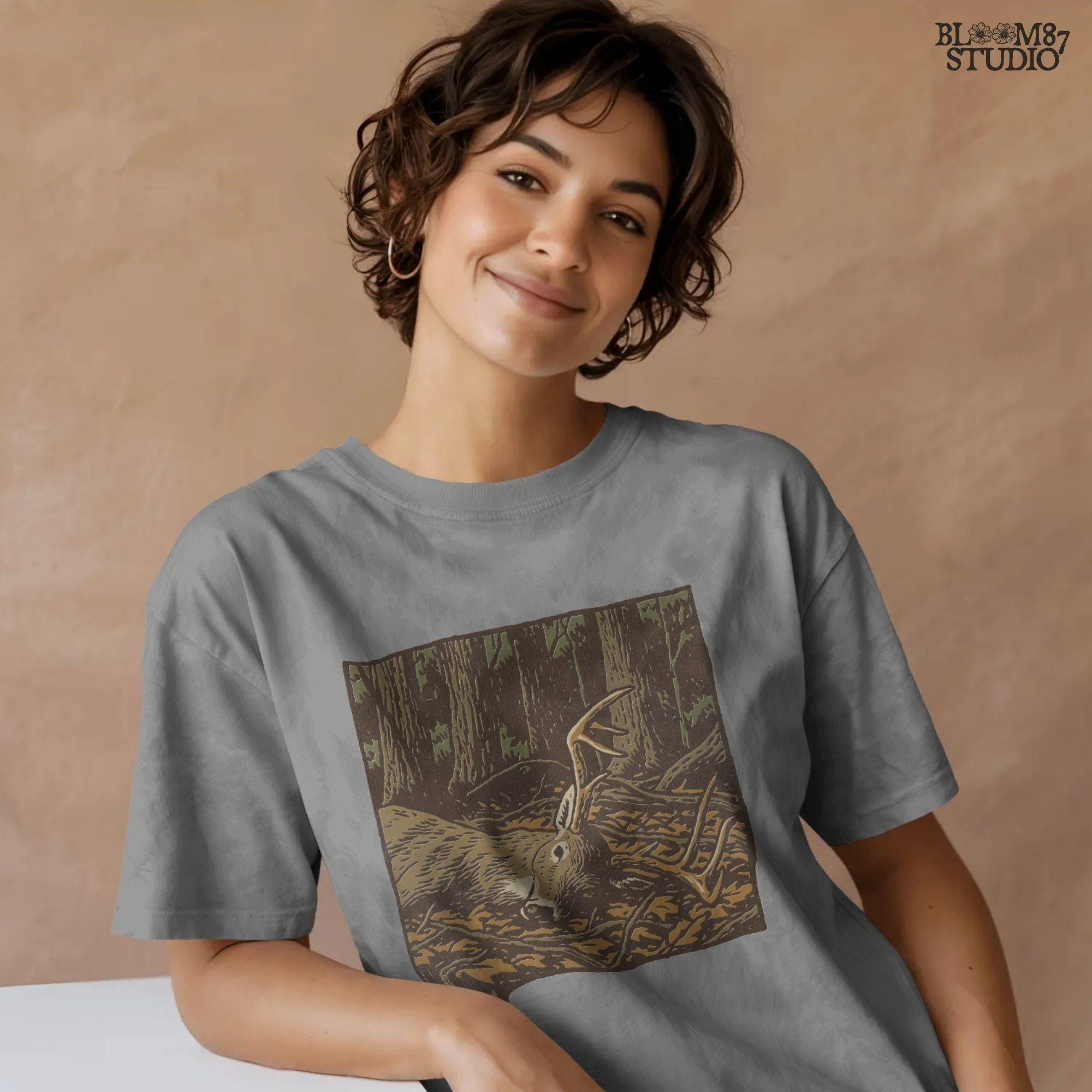 Nature artwork of a deer buck with large antlers resting in autumn woods, designed for hunting season shirts, mugs, tumblers, and sublimation hunting gifts.