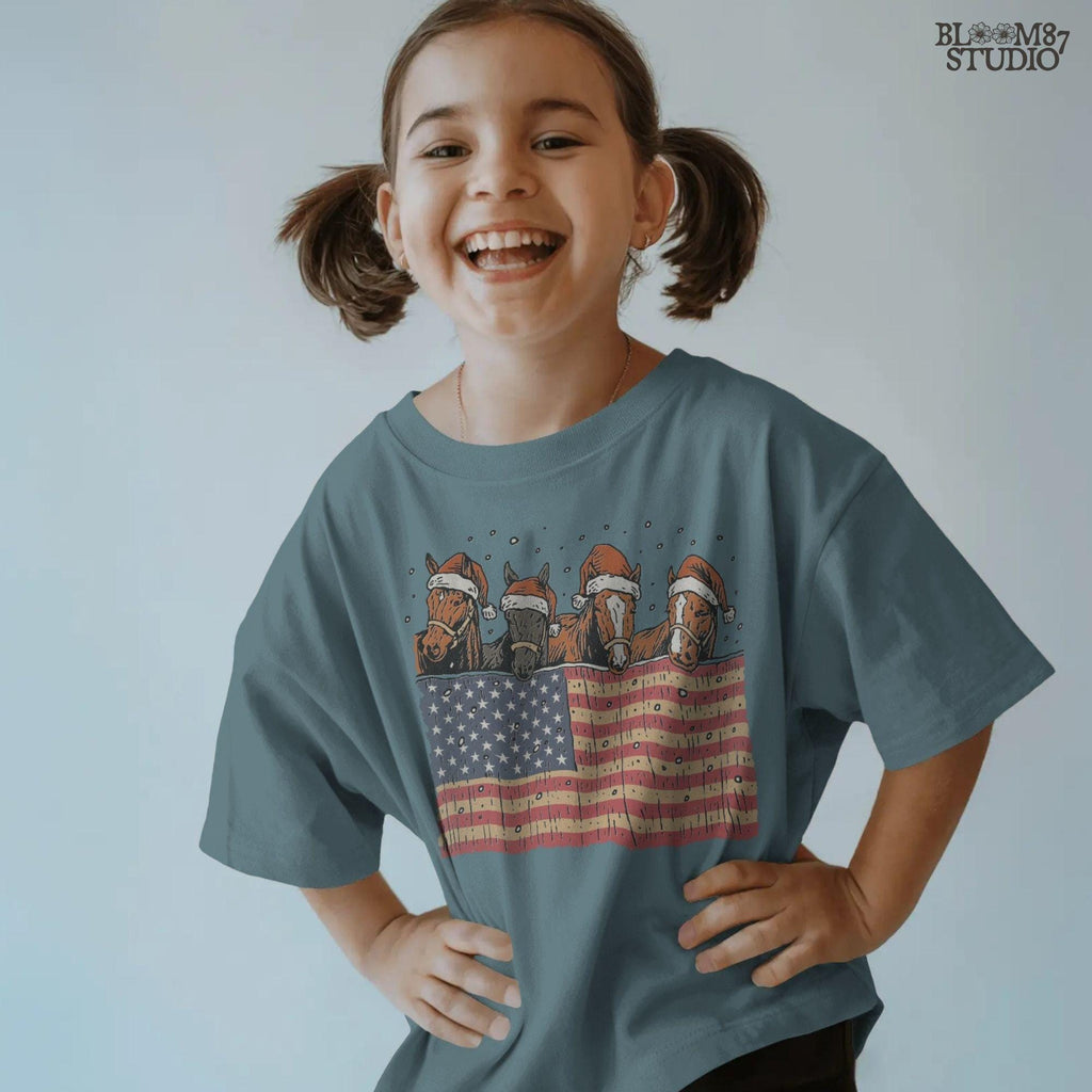 Solid Version:
Vintage illustration of four horses wearing Santa hats behind an American flag with falling snow, sublimation PNG for rustic patriotic Christmas crafts.

Distressed Version:
Distressed Christmas horse artwork with Santa hats and American flag, rustic sublimation PNG perfect for farmhouse holiday decor and festive country designs.