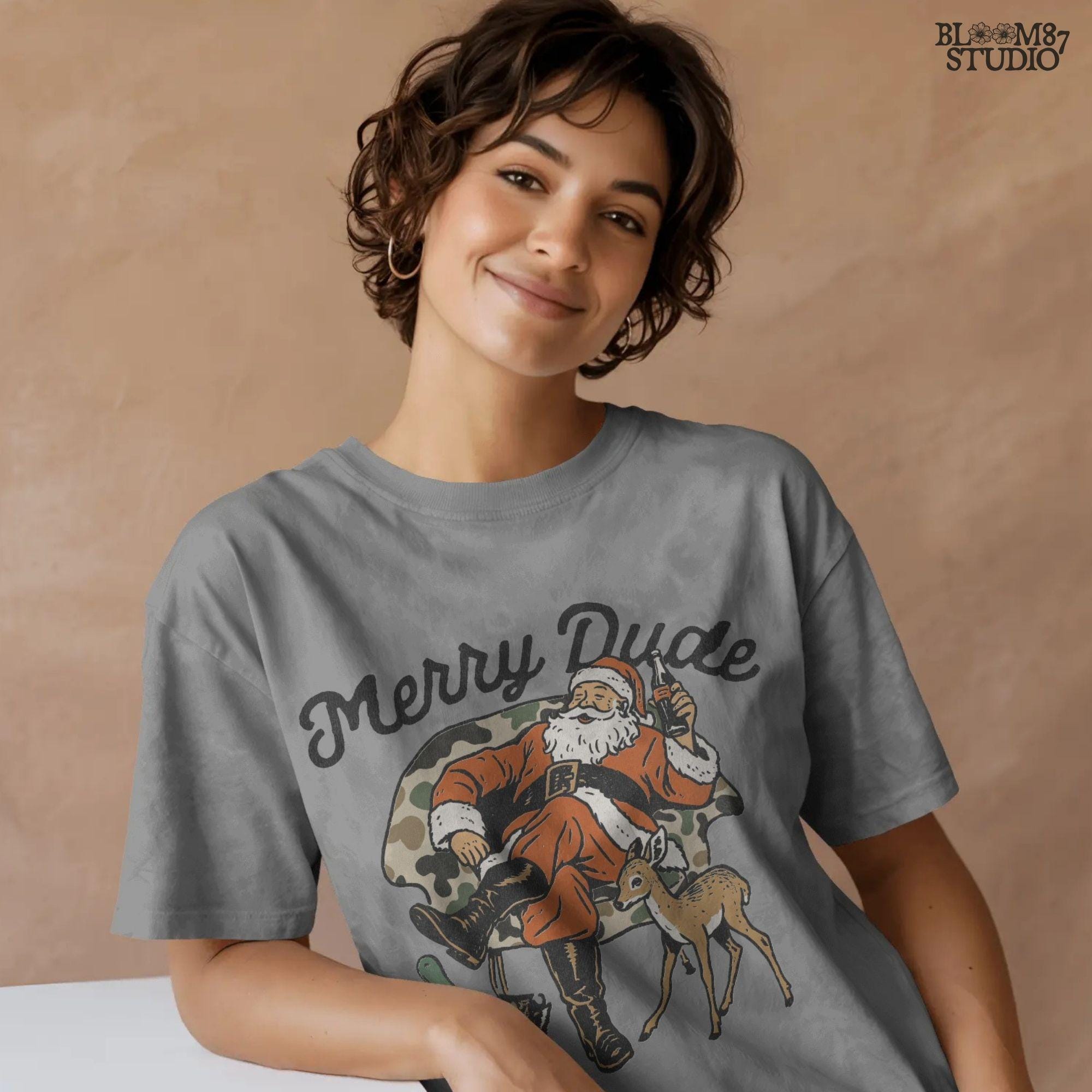 Christmas illustration featuring Santa Claus in camo chair, relaxed with soda drink, duck and deer beside him, Merry Dude slogan. Ideal for Santa Christmas clipart, hunting Christmas designs, sublimation shirts, and camo gifts.