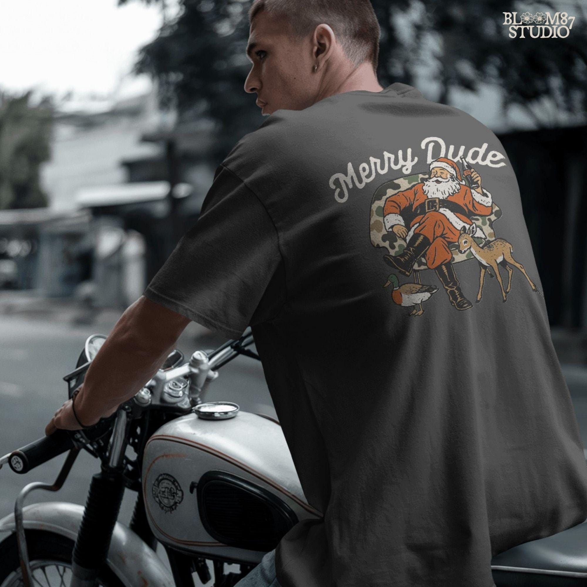 Holiday Santa design with camo theme, soda bottle, duck, deer fawn, text Merry Dude. Perfect Christmas sublimation PNG for camo Santa shirts, Christmas hunting mugs, festive gifts, and crafting projects.