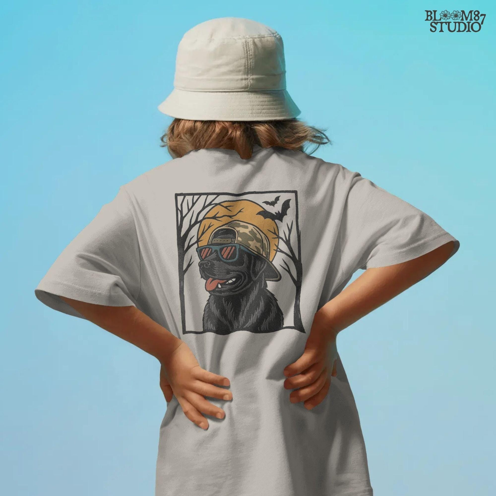 Solid version:
“Black Labrador Retriever wearing sunglasses and camo hat under full moon with bats – Halloween sublimation PNG for shirts and crafts”

Distressed version:
“Vintage distressed Black Lab Halloween sublimation PNG of Labrador Retriever in sunglasses and camo hat under moon with bats”