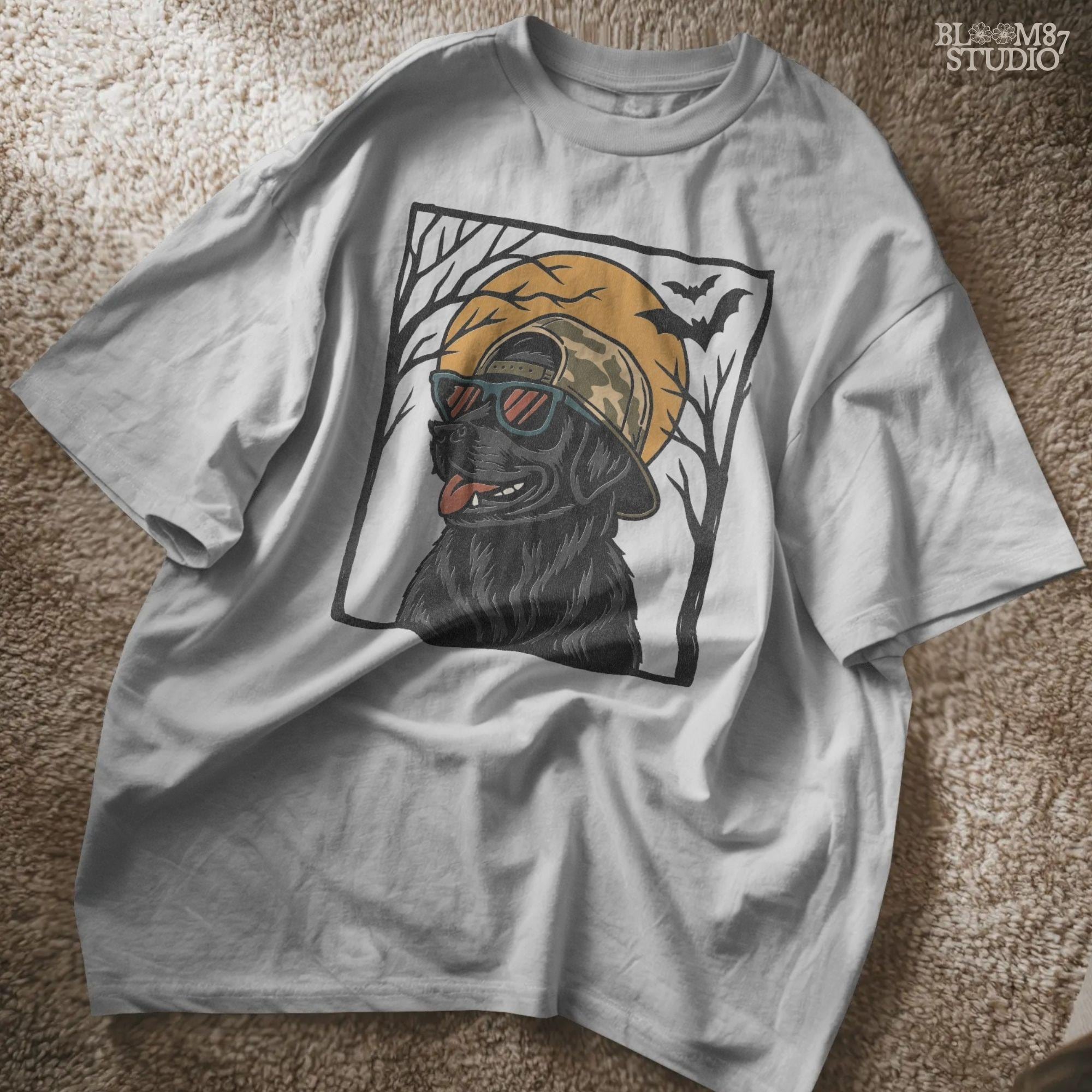 Solid version:
“Black Labrador Retriever wearing sunglasses and camo hat under full moon with bats – Halloween sublimation PNG for shirts and crafts”

Distressed version:
“Vintage distressed Black Lab Halloween sublimation PNG of Labrador Retriever in sunglasses and camo hat under moon with bats”