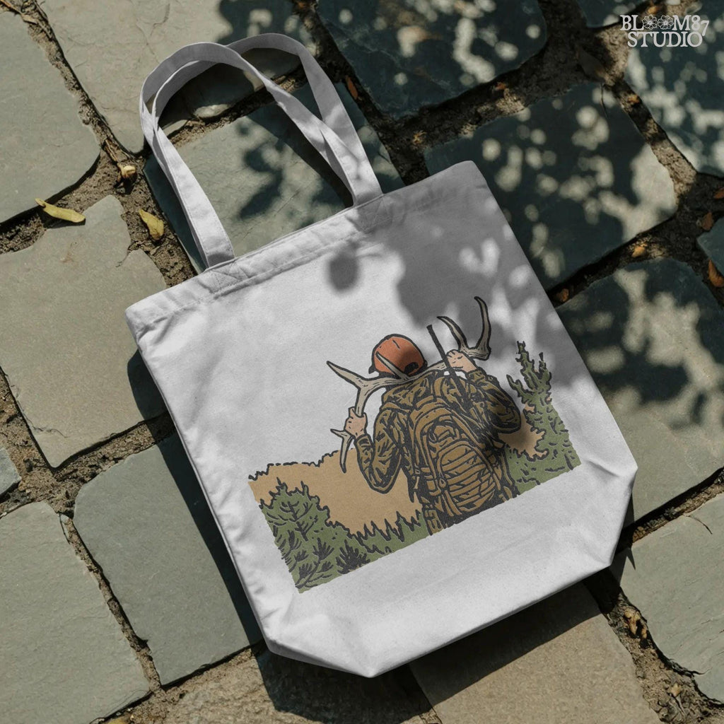 Solid version:
“Hunter carrying deer antlers on shoulders with backpack and rifle in forest – rustic hunting sublimation PNG for outdoor crafts”

Distressed version:
“Vintage distressed hunting sublimation PNG of hunter in camo with backpack and rifle carrying antlers in forest”