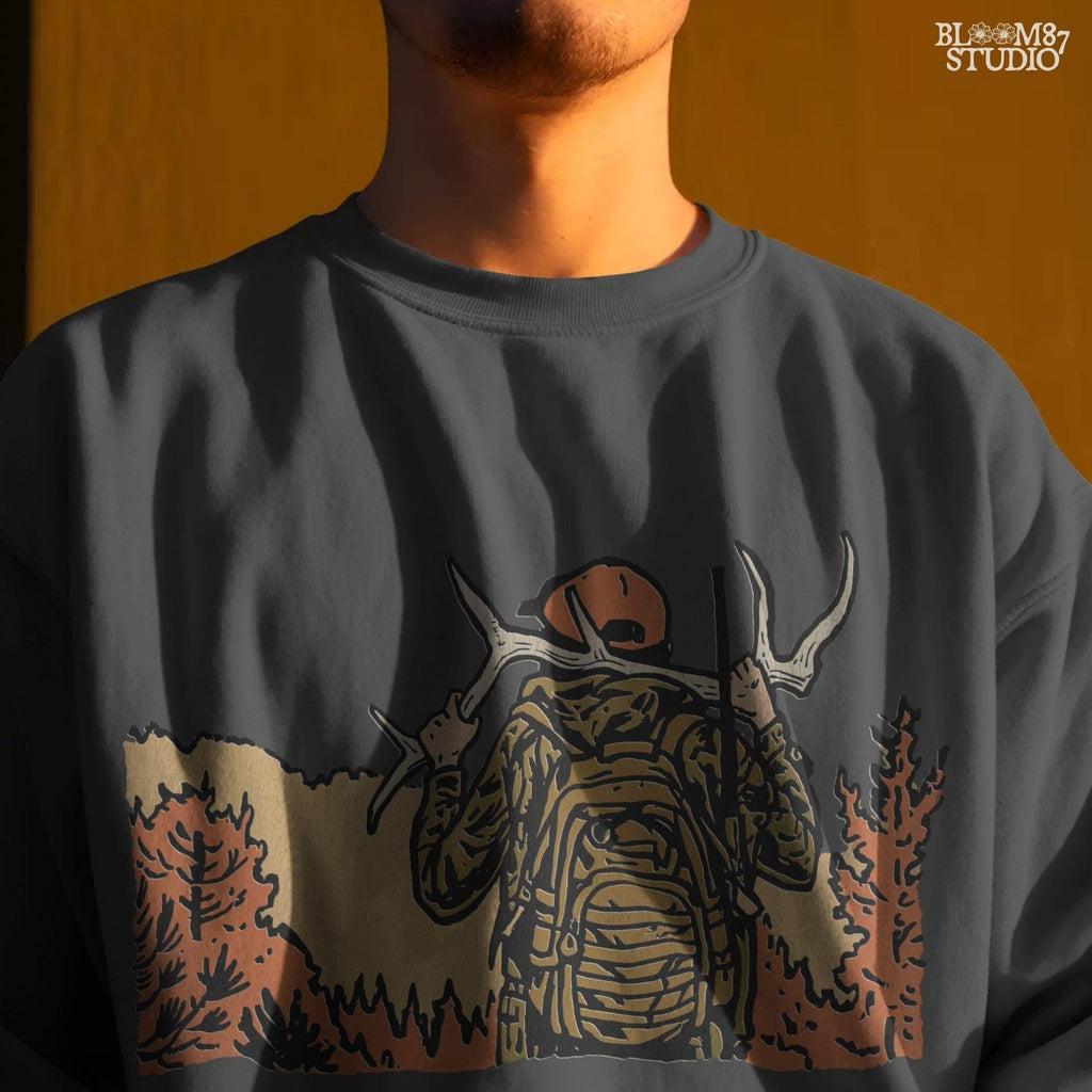 Solid version:
“Hunter carrying deer antlers with backpack in autumn forest – rustic hunting sublimation PNG for shirts and outdoor crafts”

Distressed version:
“Vintage distressed hunting sublimation PNG of hunter with antlers and backpack in autumn forest – rustic outdoor shirt design”