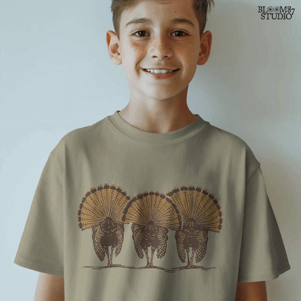 Solid version:
“Three wild turkeys with large tail feathers displayed – rustic turkey sublimation PNG for farmhouse crafts and hunting designs”

Distressed version:
“Vintage distressed turkey sublimation PNG of three wild turkeys with tail feathers fanned out – rustic hunting and farmhouse shirt design”