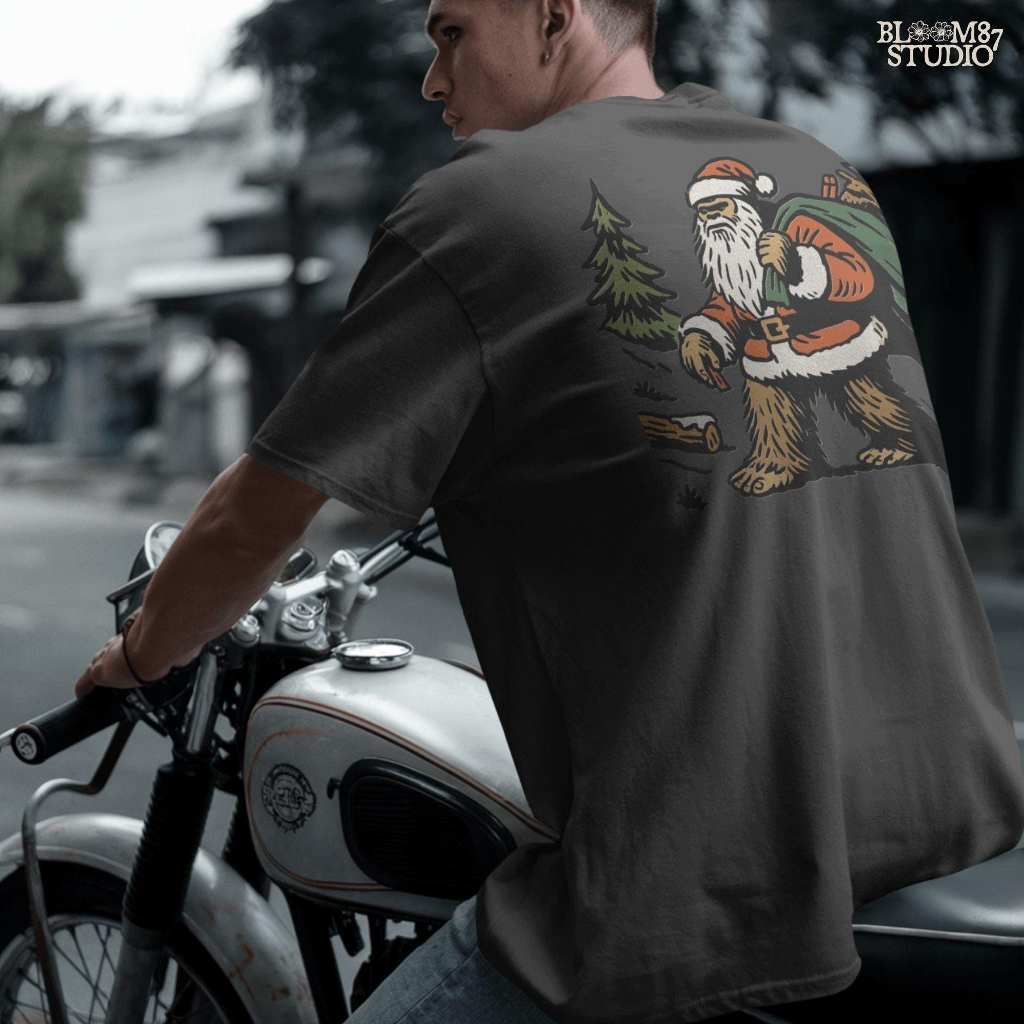 Solid version:
“Bigfoot dressed as Santa carrying green sack with reindeer and gifts in woodland scene – Christmas sublimation PNG for holiday crafts”

Distressed version:
“Vintage distressed sublimation PNG of Santa Bigfoot with sack of gifts and reindeer in rustic woodland scene – Christmas holiday shirt design”