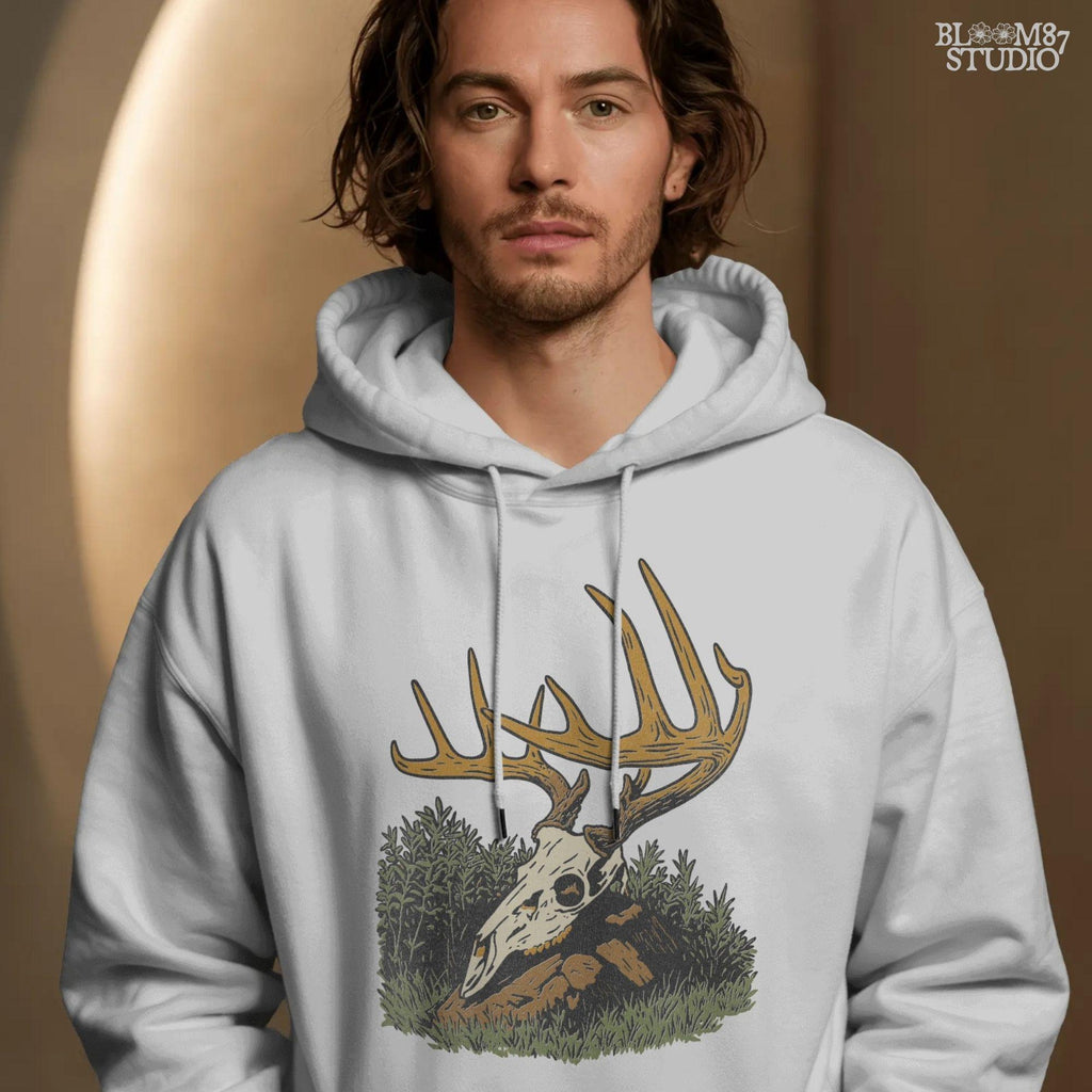 Solid version:
“Deer skull with large antlers resting in grass and rocks – rustic hunting sublimation PNG for crafts and lodge décor”

Distressed version:
“Vintage distressed sublimation PNG of deer skull with antlers in grass – rustic hunting and outdoor lodge shirt design”