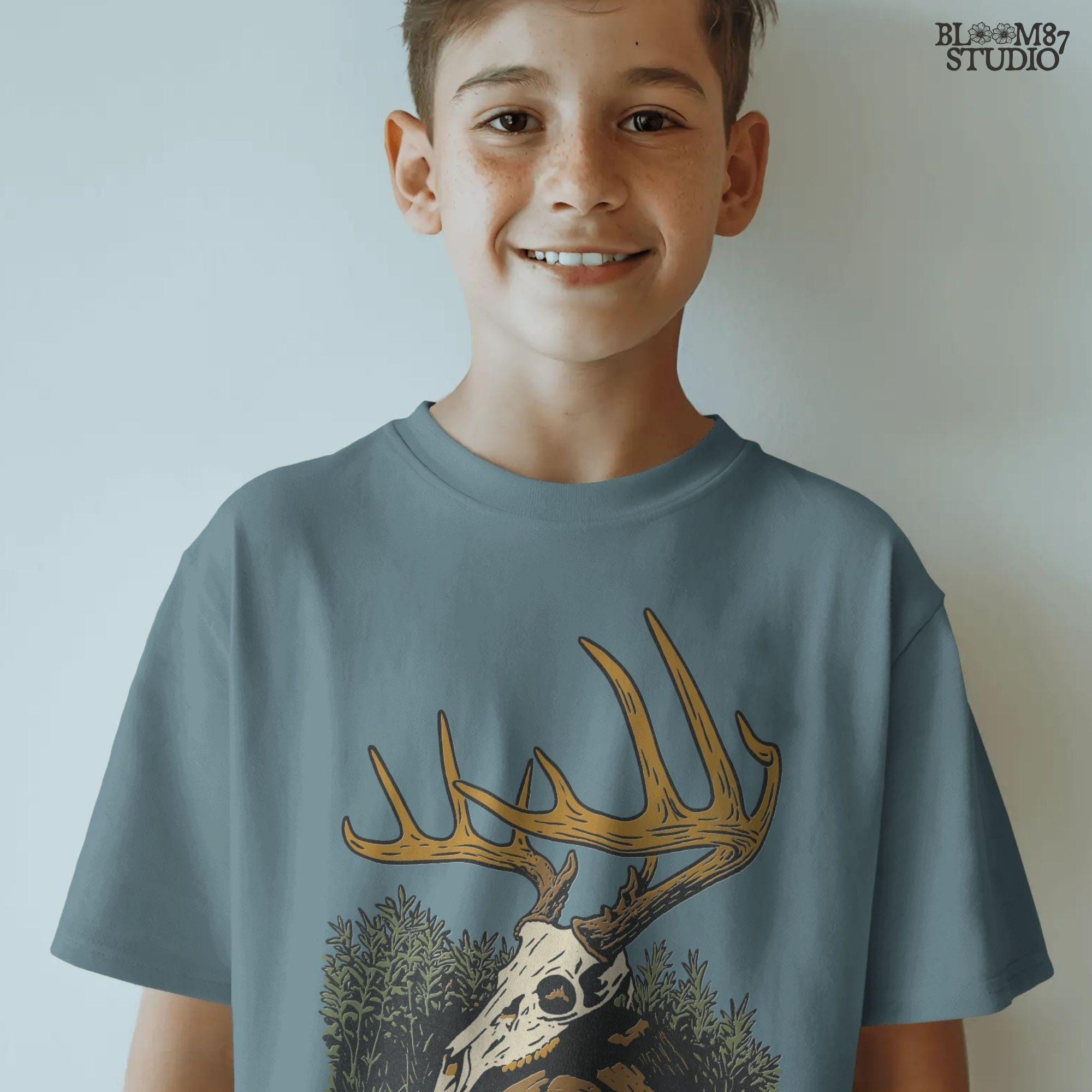 Solid version:
“Deer skull with large antlers resting in grass and rocks – rustic hunting sublimation PNG for crafts and lodge décor”

Distressed version:
“Vintage distressed sublimation PNG of deer skull with antlers in grass – rustic hunting and outdoor lodge shirt design”