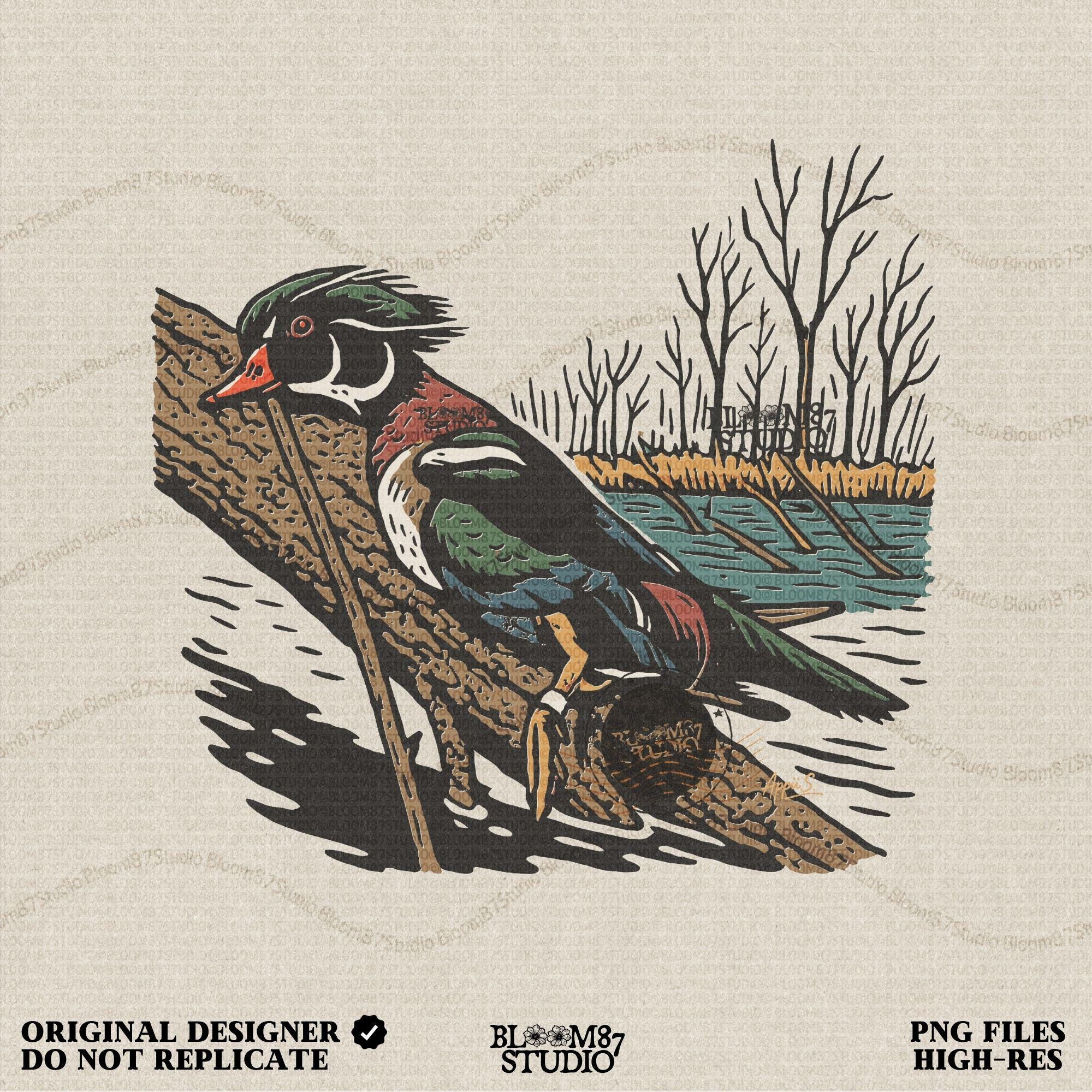 Solid version:
“Colorful wood duck perched on tree branch by lake with trees – waterfowl sublimation PNG for hunting and outdoor crafts”

Distressed version:
“Vintage distressed sublimation PNG of wood duck on branch by lake and trees – rustic hunting and lodge décor design”