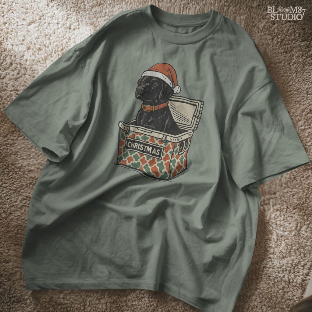 Solid version:
“Black lab dog wearing Santa hat sitting inside Christmas cooler box – holiday sublimation PNG for festive crafts and pet lover gifts”

Distressed version:
“Vintage distressed PNG of black lab with Santa hat in Christmas cooler – festive sublimation design for winter crafts and décor”