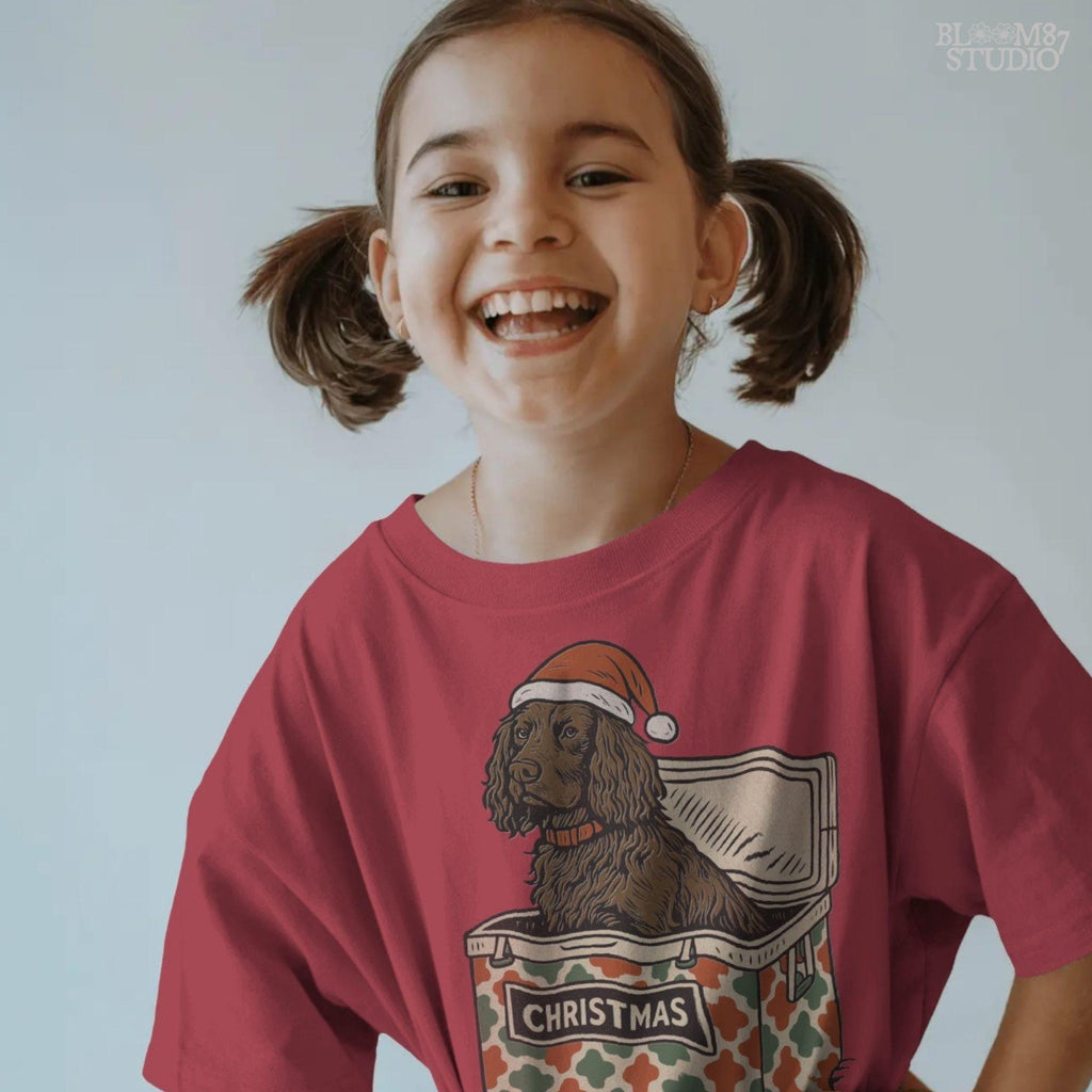 “Brown spaniel dog wearing Santa hat sitting inside Christmas cooler box – holiday sublimation PNG for festive crafts and pet lover gifts”

Distressed version:
“Vintage distressed PNG of spaniel dog with Santa hat in Christmas cooler – festive sublimation design for winter crafts and holiday décor”