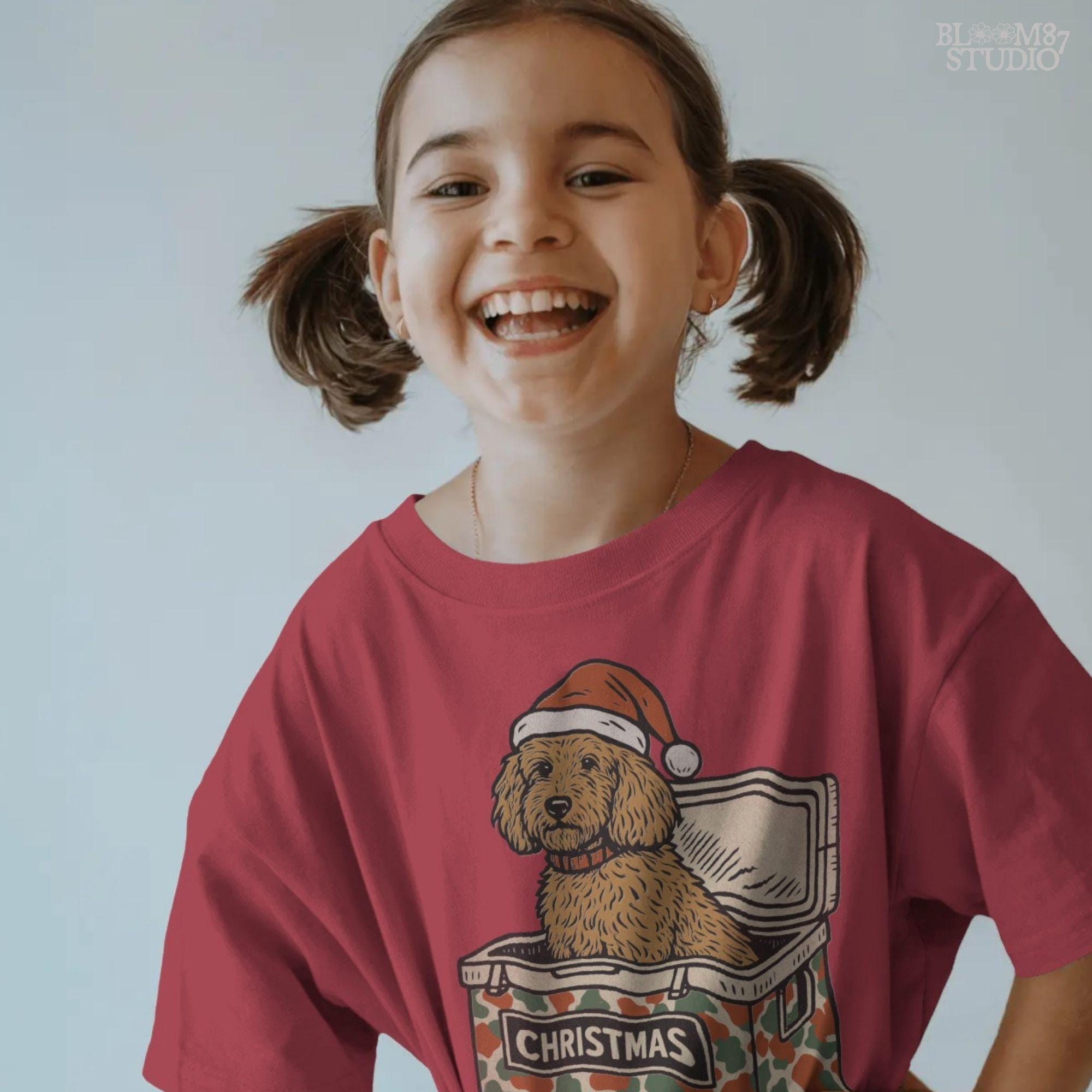 Solid version:
“Brown spaniel dog wearing Santa hat sitting inside Christmas cooler box – holiday sublimation PNG for festive crafts and pet lover gifts”

Distressed version:
“Vintage distressed PNG of spaniel dog with Santa hat in Christmas cooler – festive sublimation design for winter crafts and holiday décor”