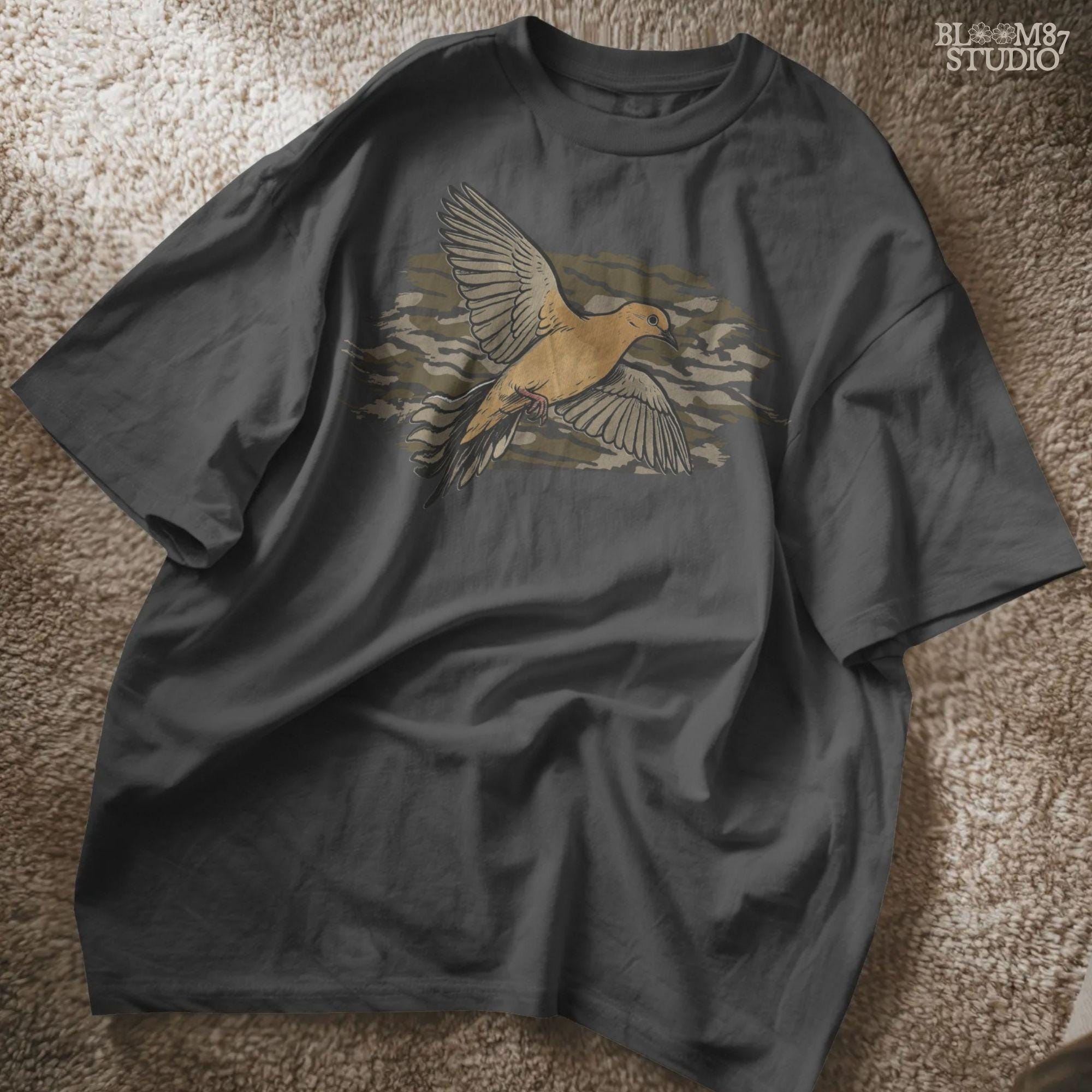 Solid version: Illustration of a mourning dove flying with wings spread, set against a camouflage background, hunting sublimation PNG.
Distressed version: Vintage mourning dove in flight with camo background, rustic distressed hunting PNG for outdoor crafts.