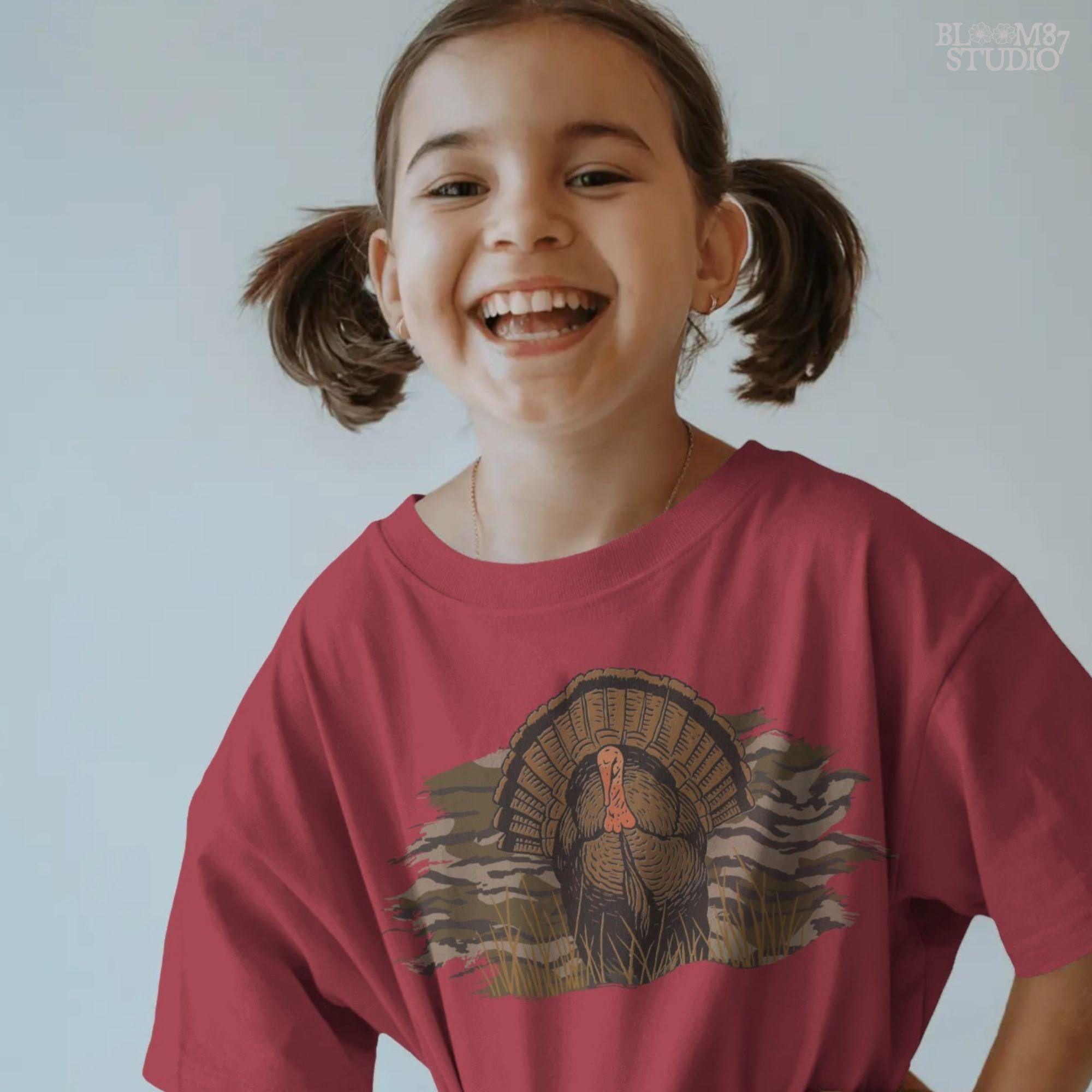 Solid version: Illustration of a wild turkey gobbler with camo background, hunting sublimation PNG.
Distressed version: Vintage distressed turkey with fan tail and camouflage backdrop, rustic hunting PNG.