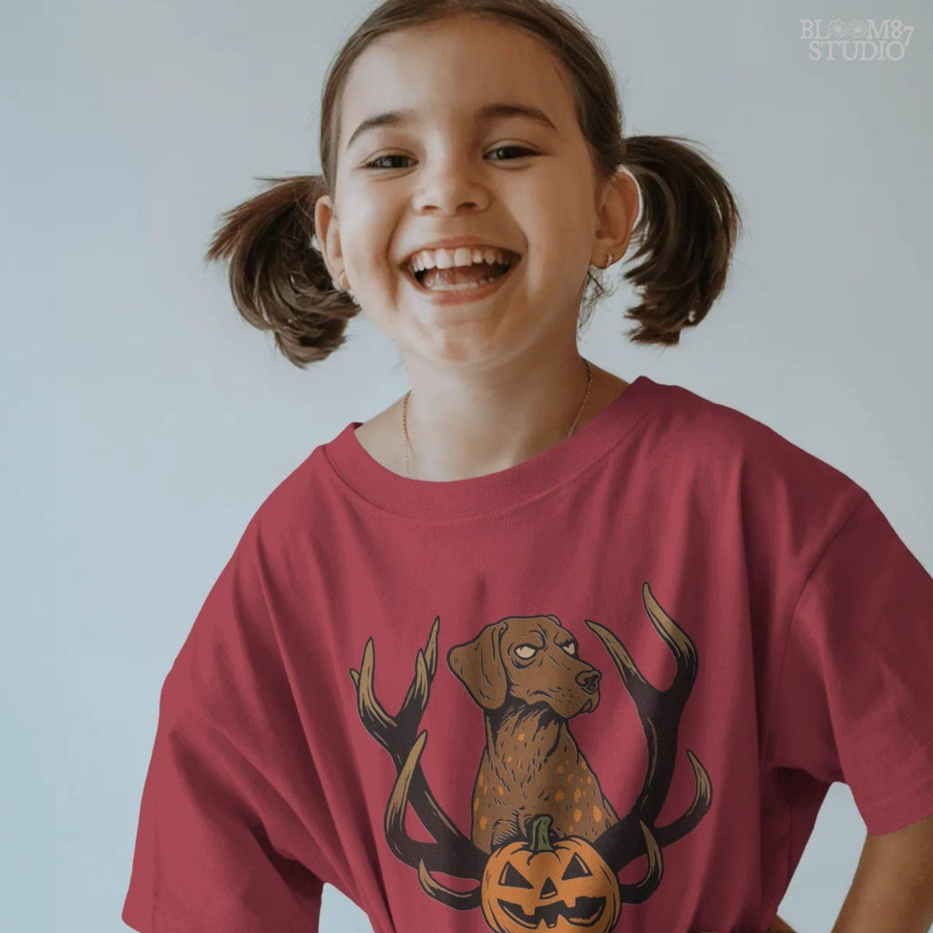 Solid version: Halloween dog PNG with antlers and pumpkin, spooky hunting dog digital download.

Distressed version: Vintage Halloween dog PNG with antlers and jack-o’-lantern, rustic hunting sublimation design.