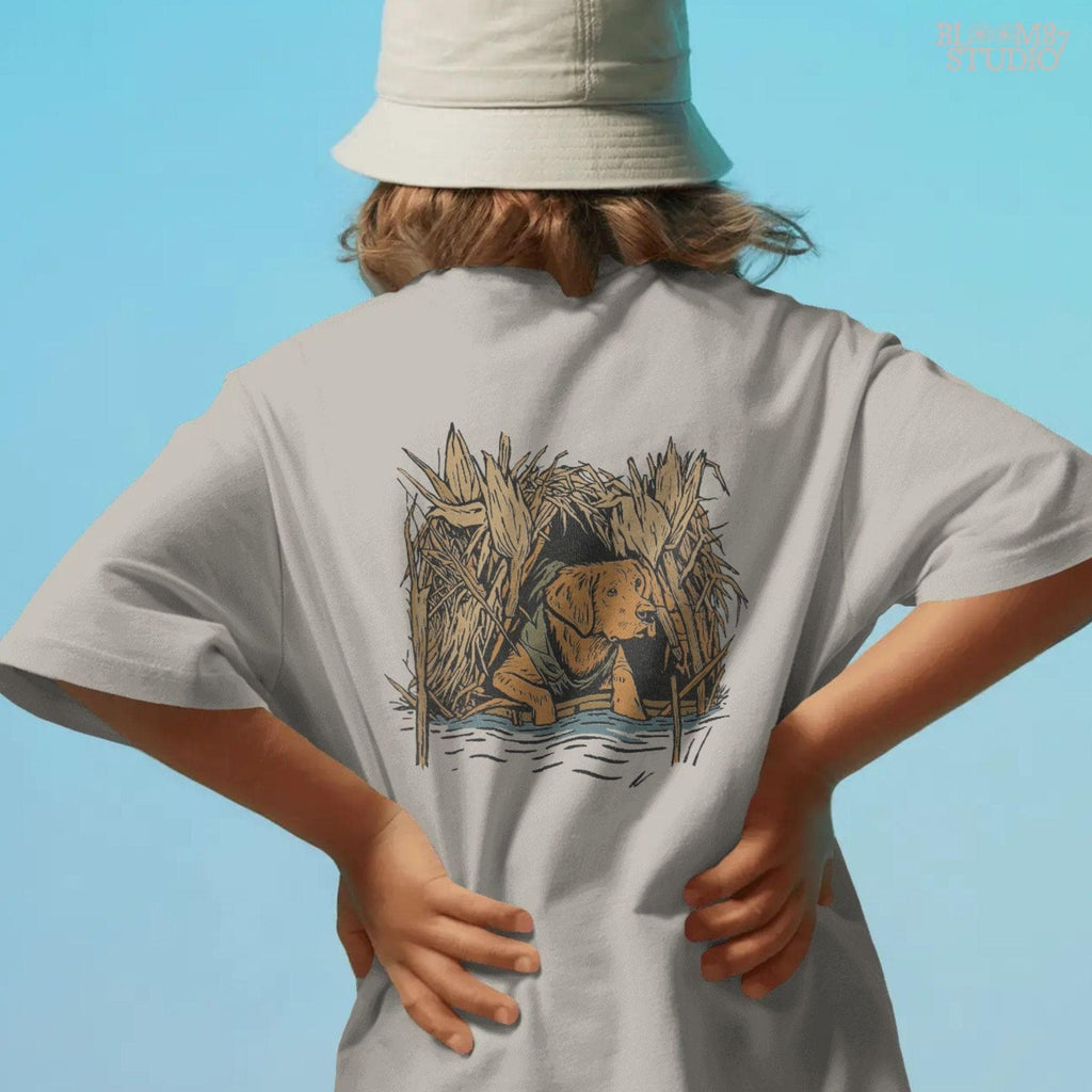 Solid: “Hunting dog PNG of retriever in marsh camo for duck hunting season, perfect for hunting shirts and digital download”

Distressed: “Vintage hunting dog PNG with retriever in camo reeds, rustic distressed hunting art for duck hunting apparel”