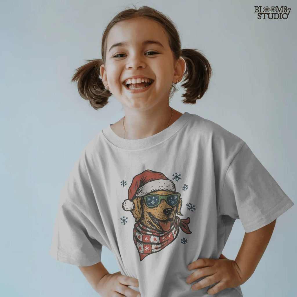 Christmas puppy PNG clipart showing retriever smiling with Santa hat and scarf. Perfect for sublimation projects, cards, and holiday shirts.