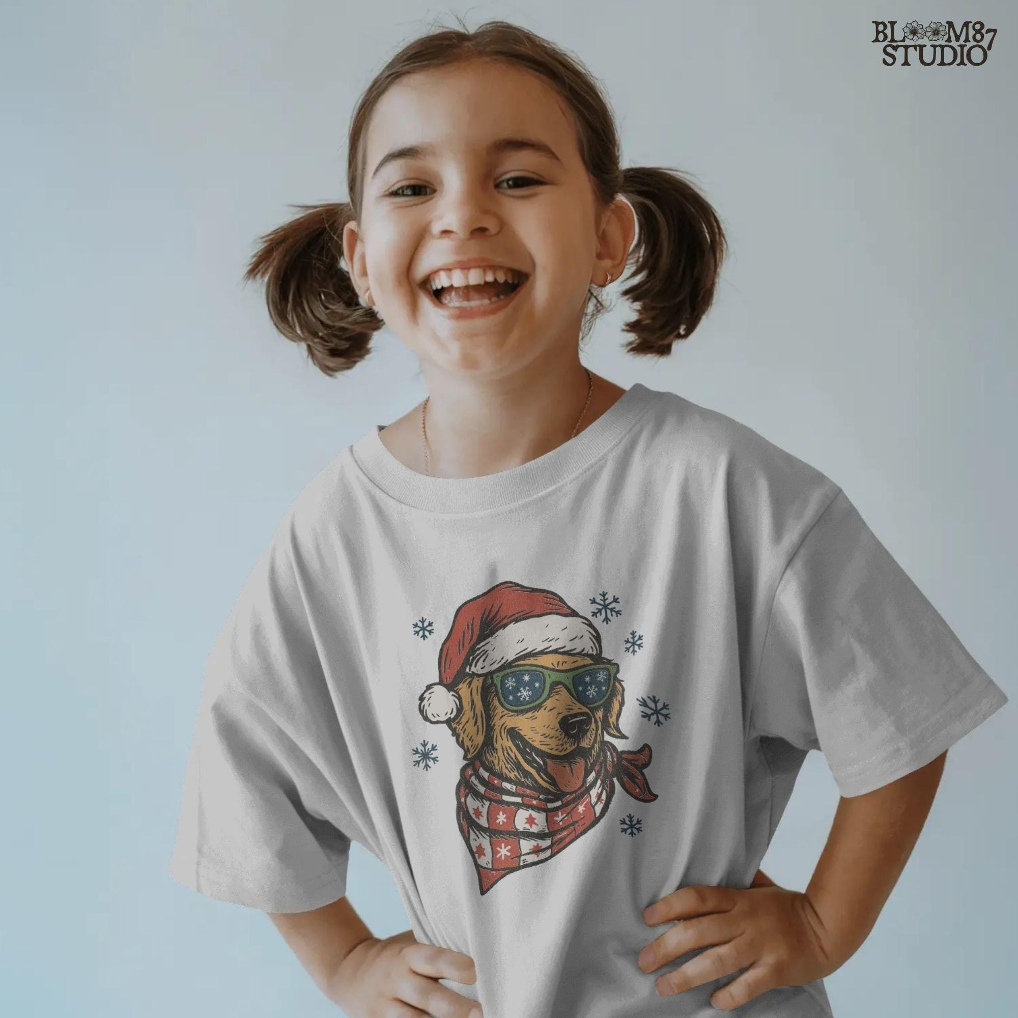 Christmas puppy PNG clipart showing retriever smiling with Santa hat and scarf. Perfect for sublimation projects, cards, and holiday shirts.