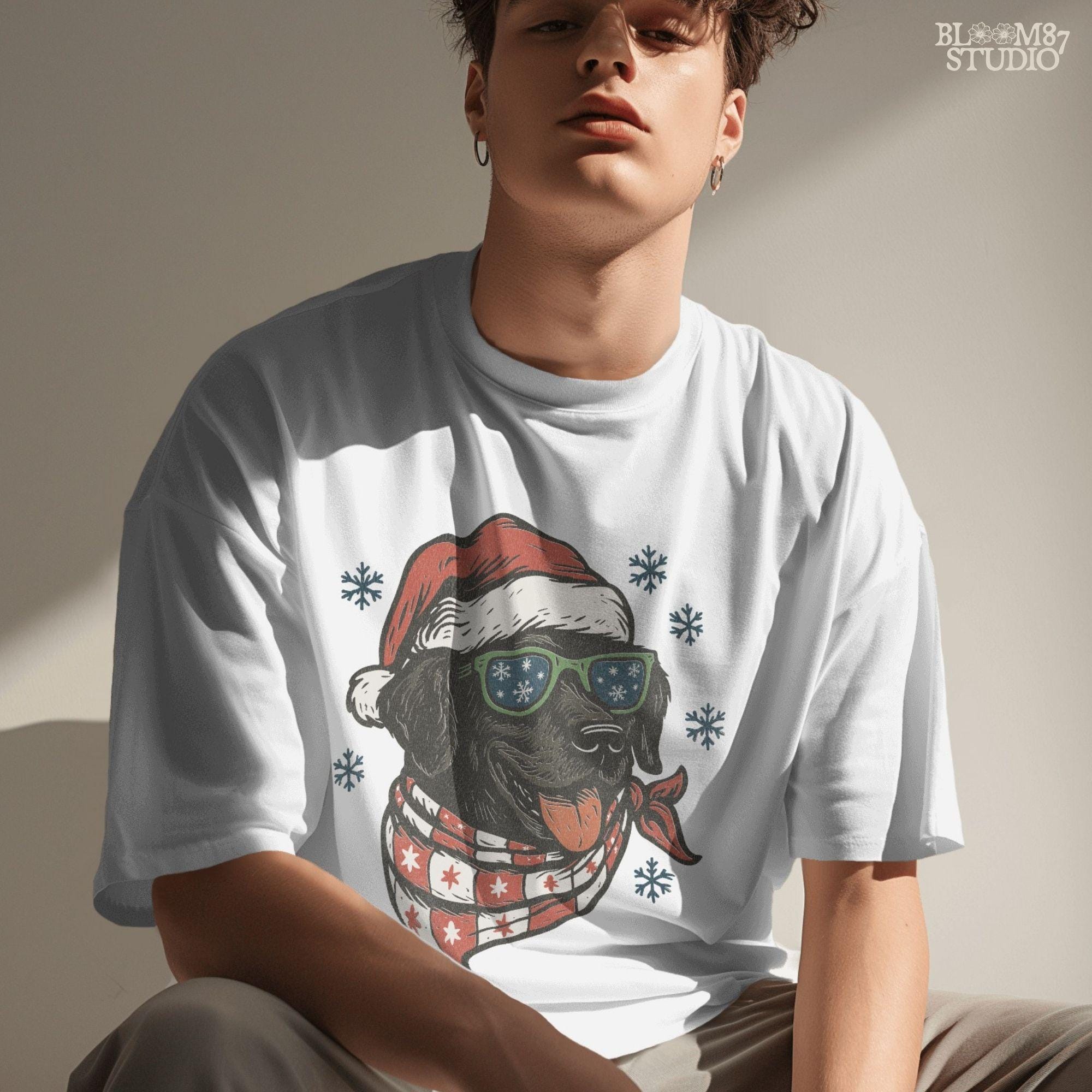 Black Labrador Christmas dog graphic with Santa hat and scarf, perfect for dog lover Christmas shirts, gifts, and decorations.