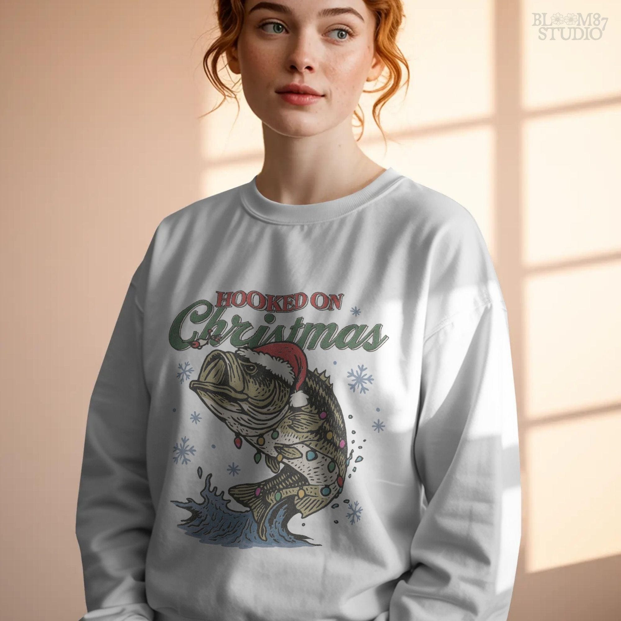 Funny Christmas fishing sublimation design featuring bass fish and holiday lights, great for personalized gifts and apparel.