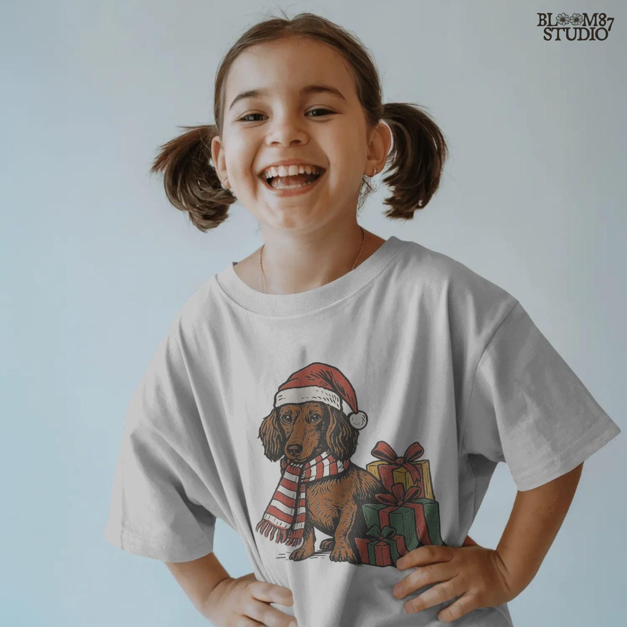 Cute dachshund in Christmas outfit with presents, perfect PNG for holiday sublimation, Christmas crafts, festive t-shirts, and mugs.