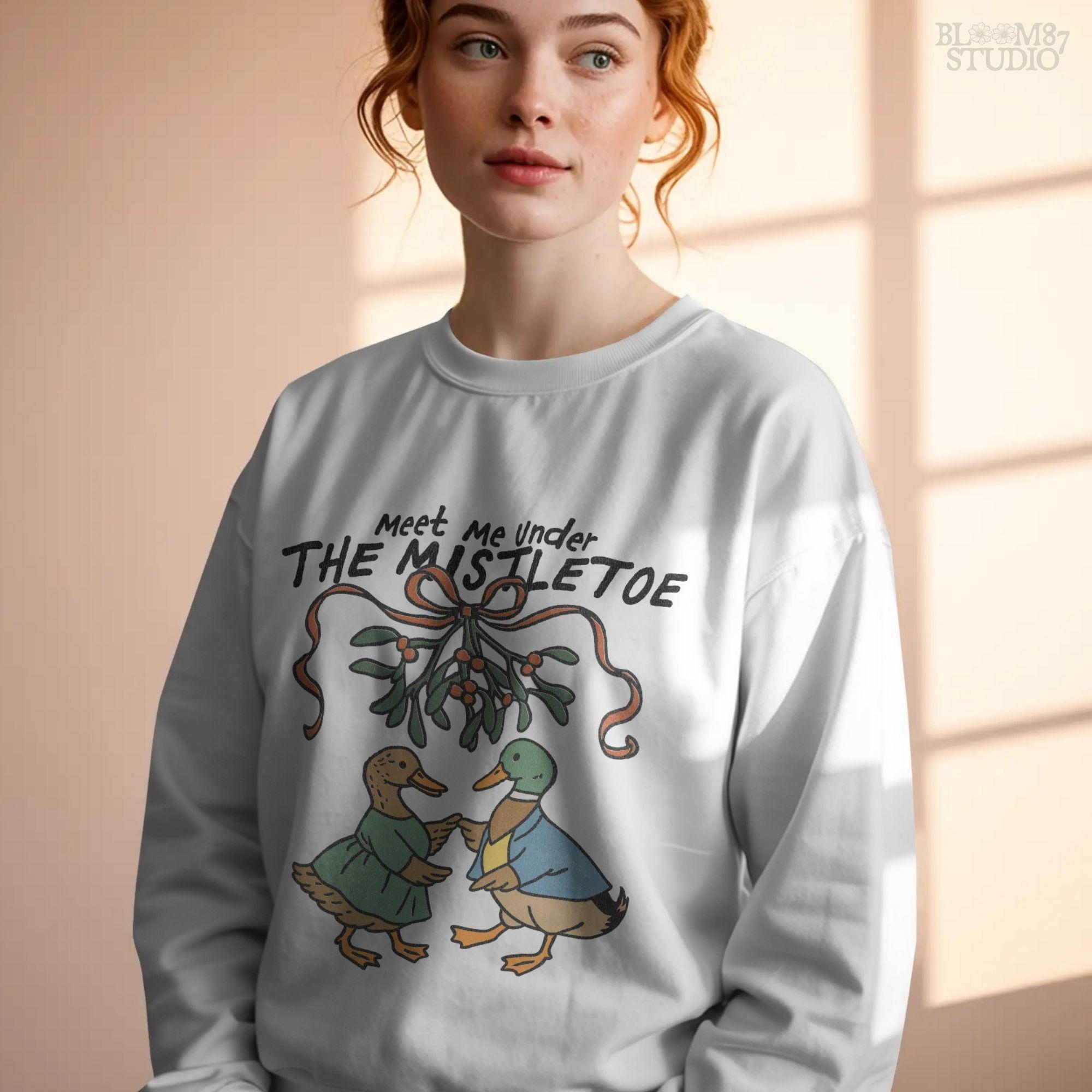 Holiday PNG artwork of two anthropomorphic ducks in vintage outfits, holding hands under a festive mistletoe.