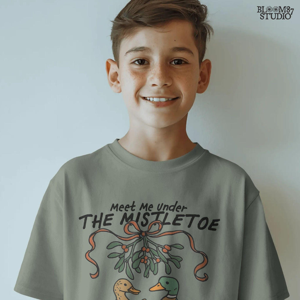 Digital Christmas art of a duck pair in vintage-style dresses and jackets, under mistletoe, for seasonal craft projects.