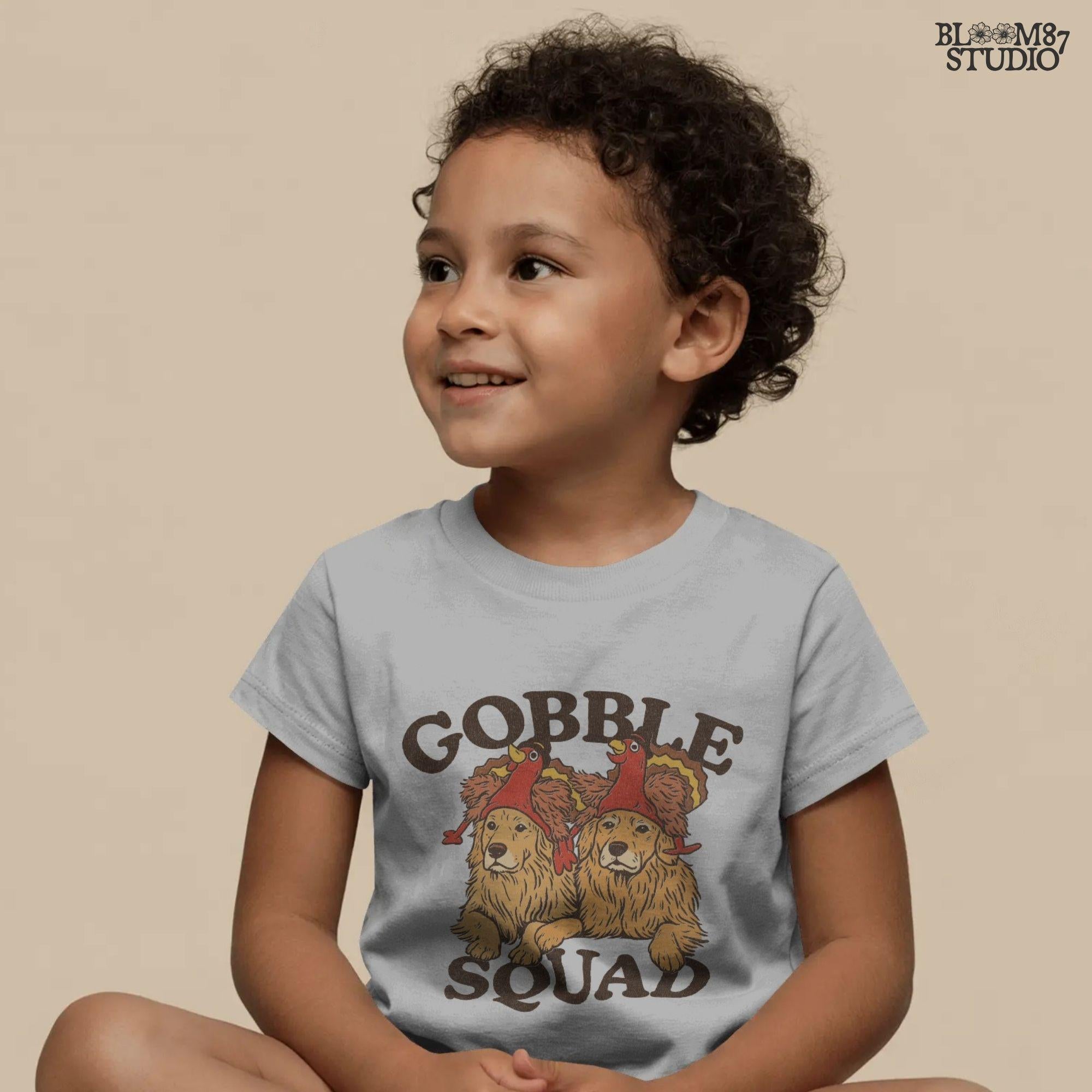 Playful fall dog clipart for Thanksgiving with golden retrievers dressed in turkey hats, Gobble Squad text, and festive humor. Great for sublimation on shirts, mugs, tumblers, and decor.