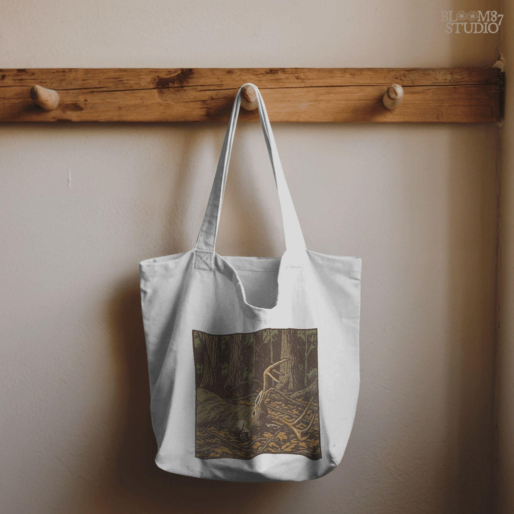 Detailed drawing of a deer buck with tall antlers on the woodland floor, designed for fall hunting shirts, deer hunting mugs, tumblers, decals, and hunting wall art.